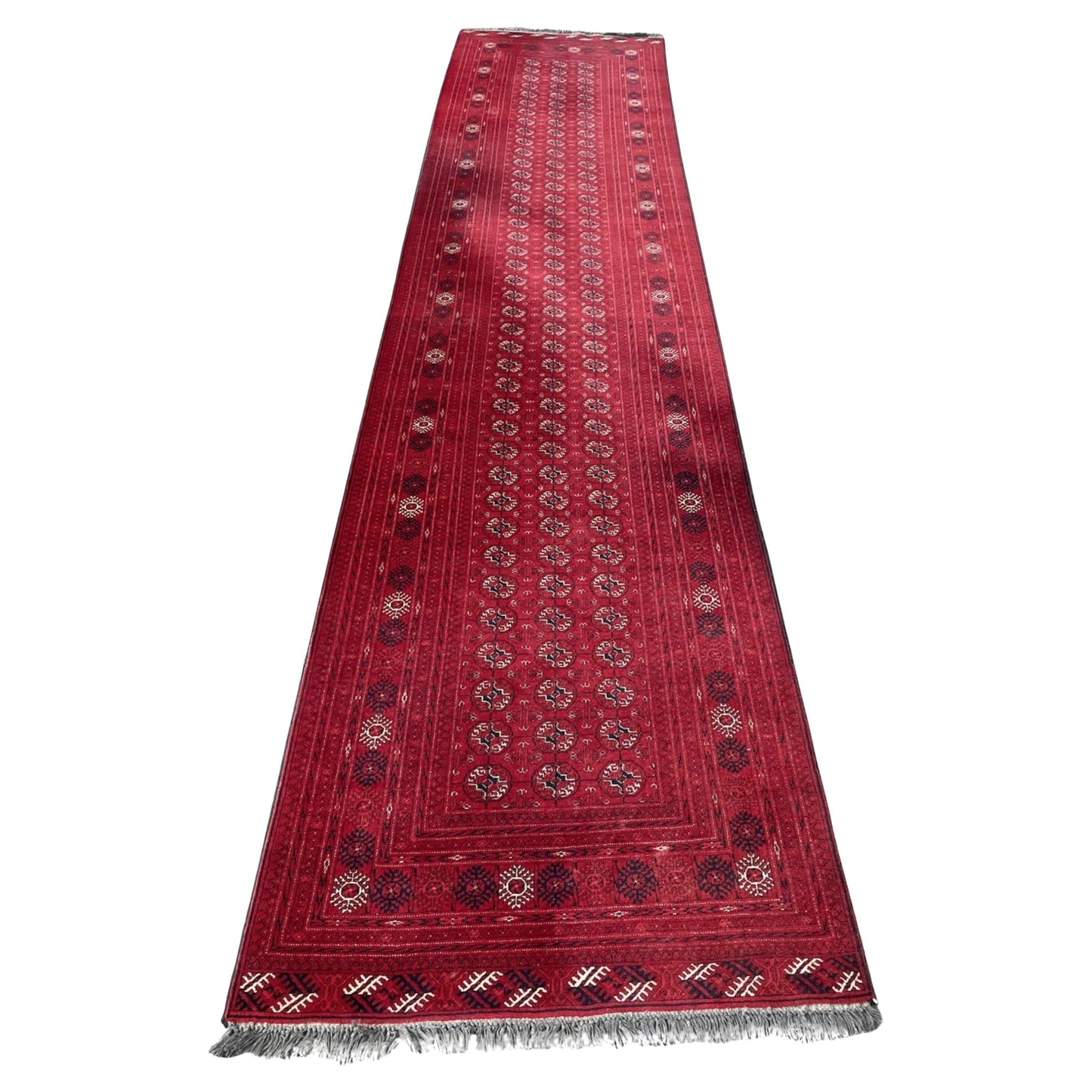 Antique Ersari runner with repeating geometric guls

