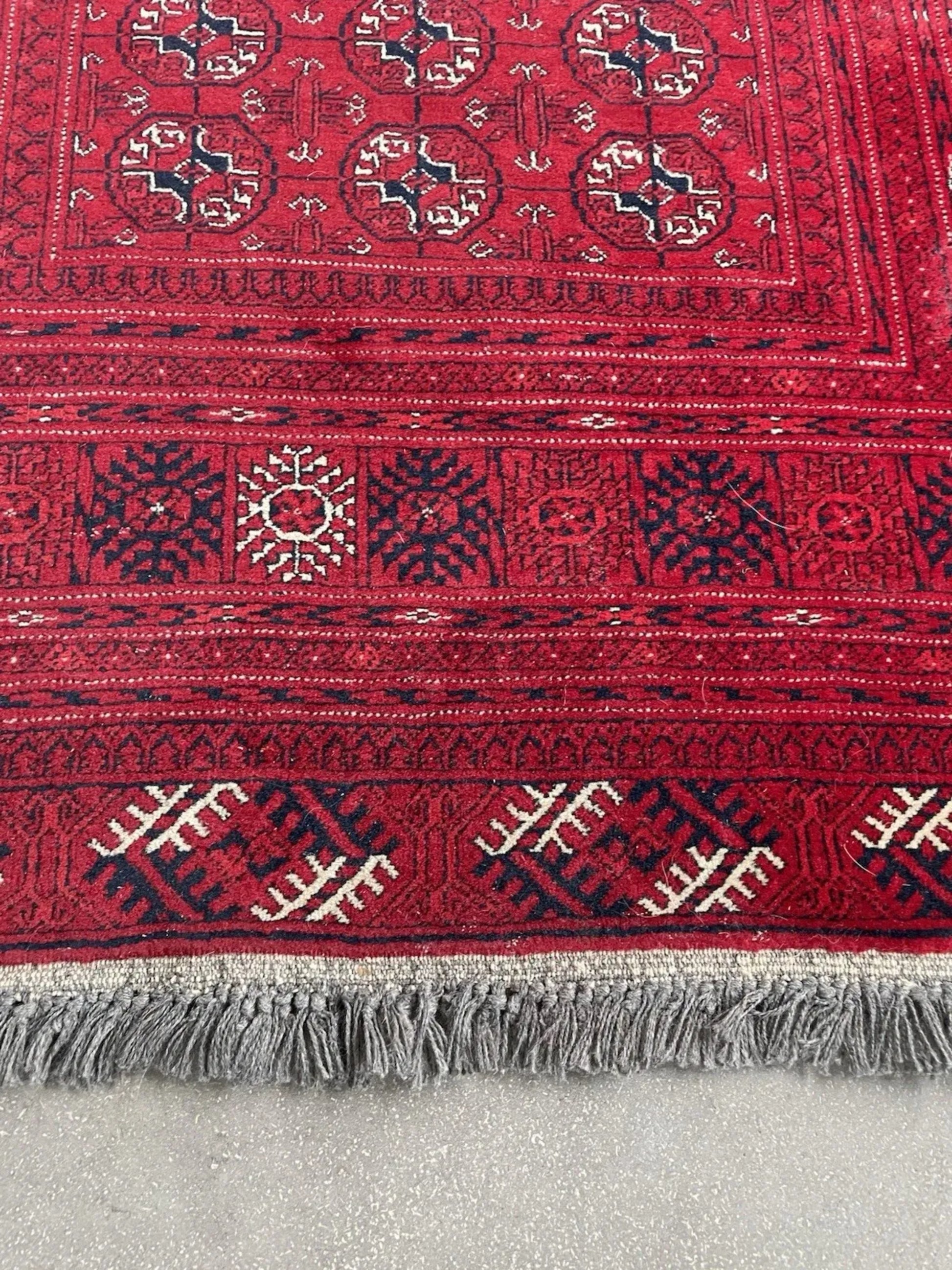 Close-up of intricate gul motif details

