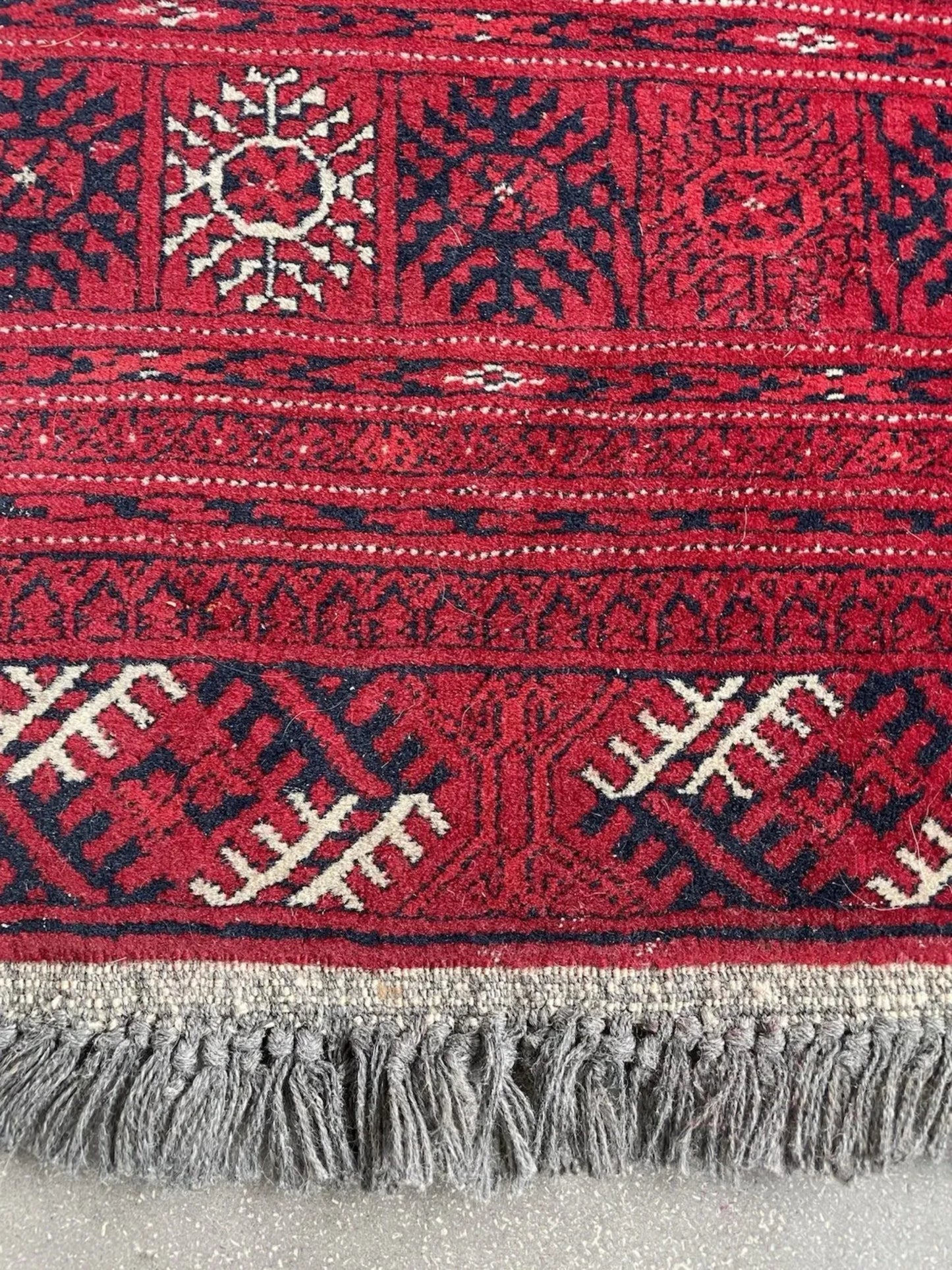 Navy blue and ivory accents in medallion design

