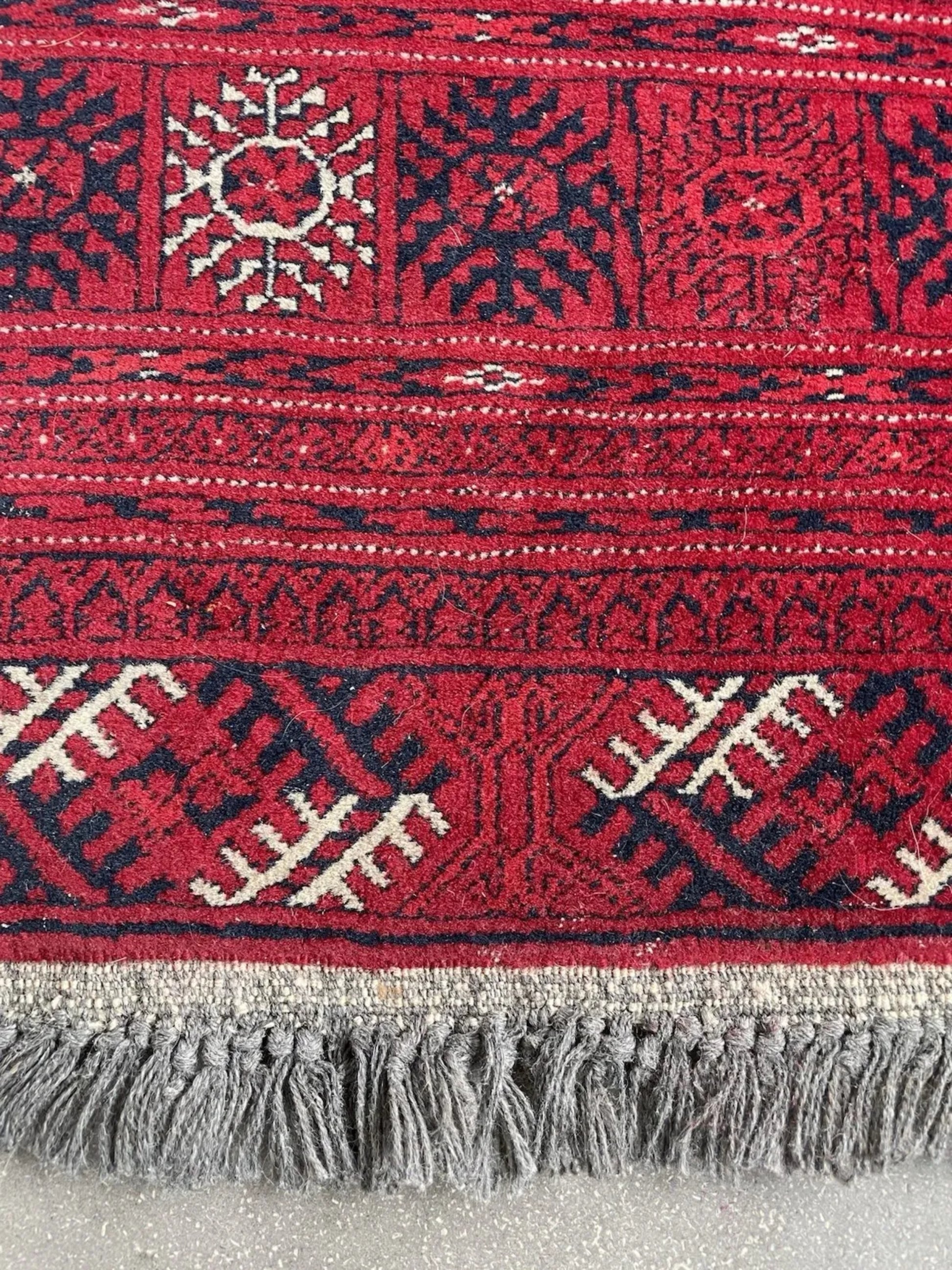 Navy blue and ivory accents in medallion design

