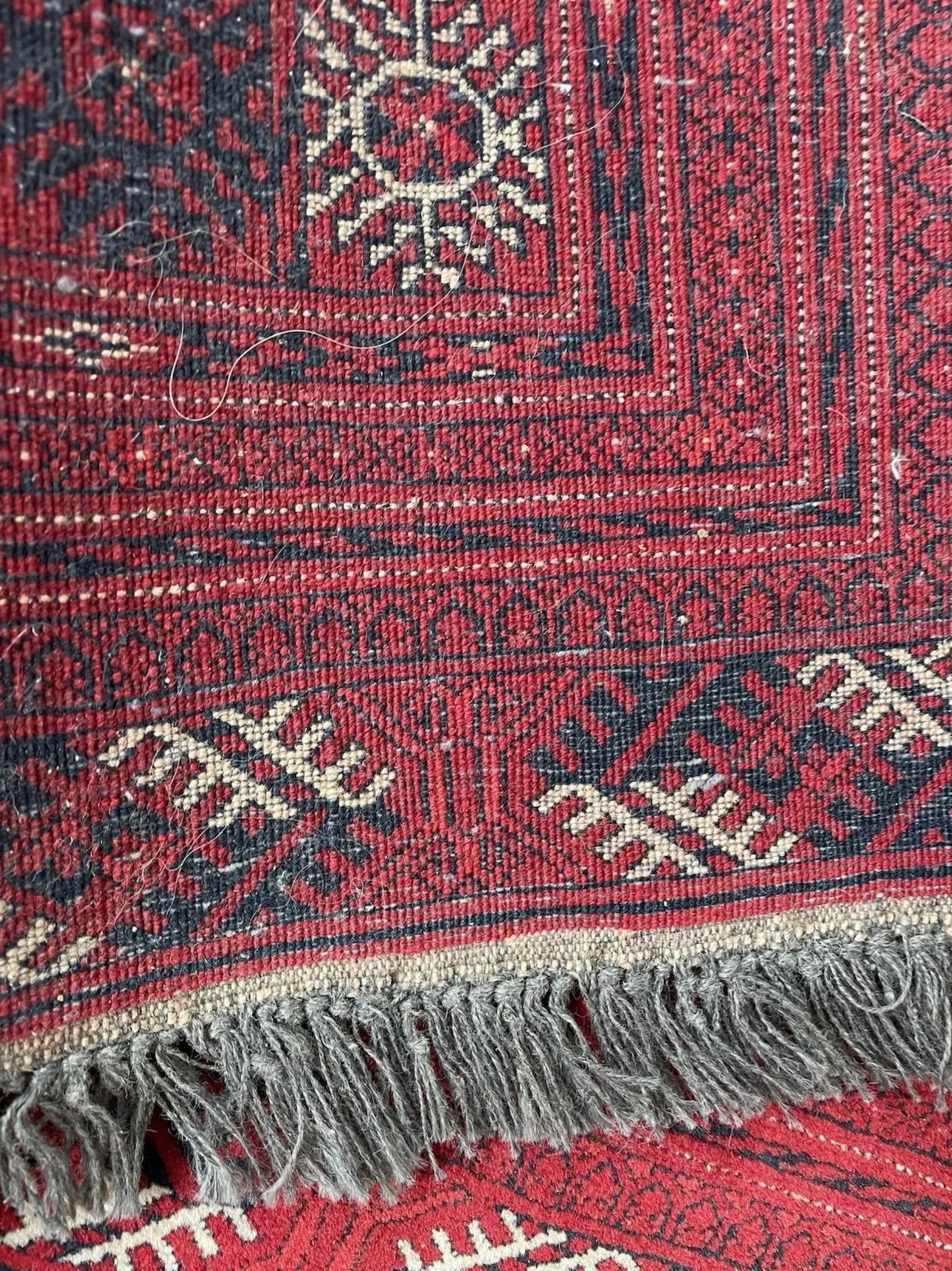 Dense wool texture with century-old patina

