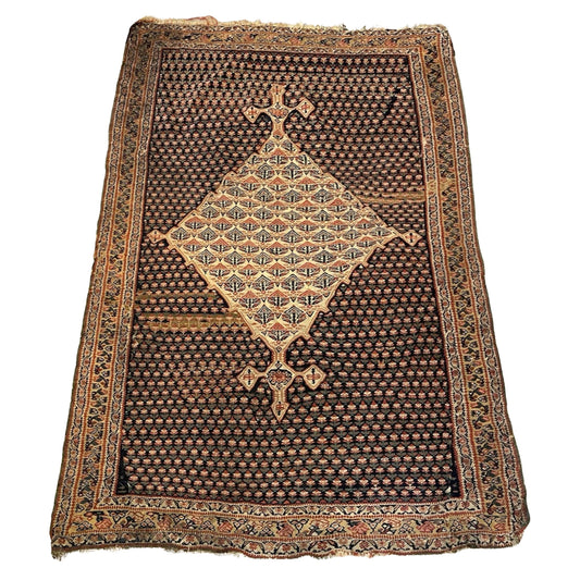 Antique Senneh rug with large diamond medallion

