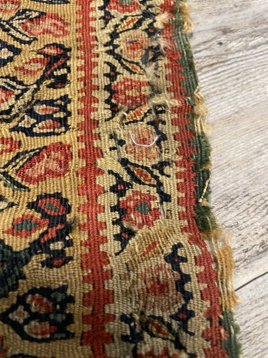 Central medallion in terracotta and slate on indigo

