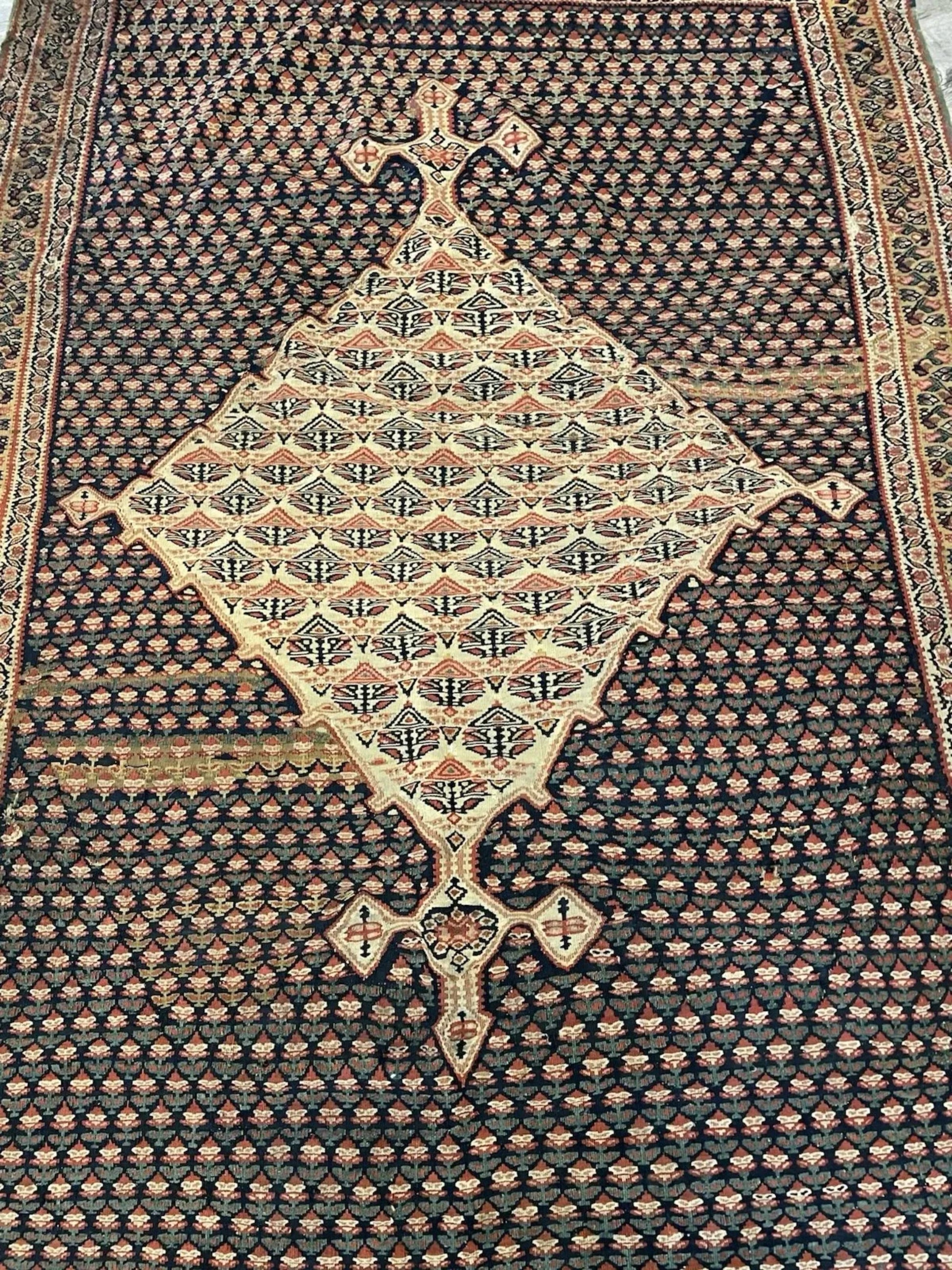 Color contrast between indigo field and terracotta motifs

