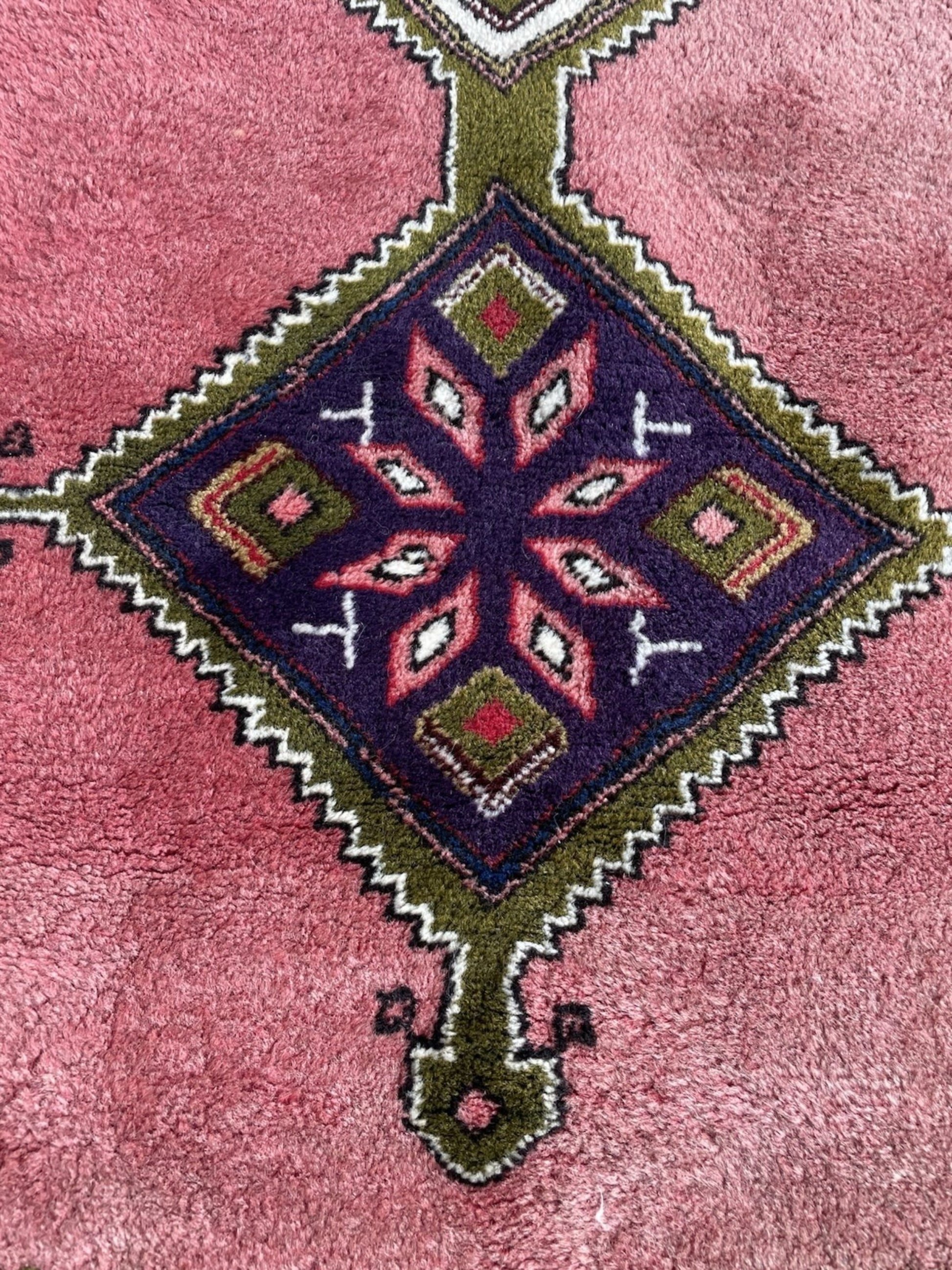 Color contrast between navy field and crimson border

