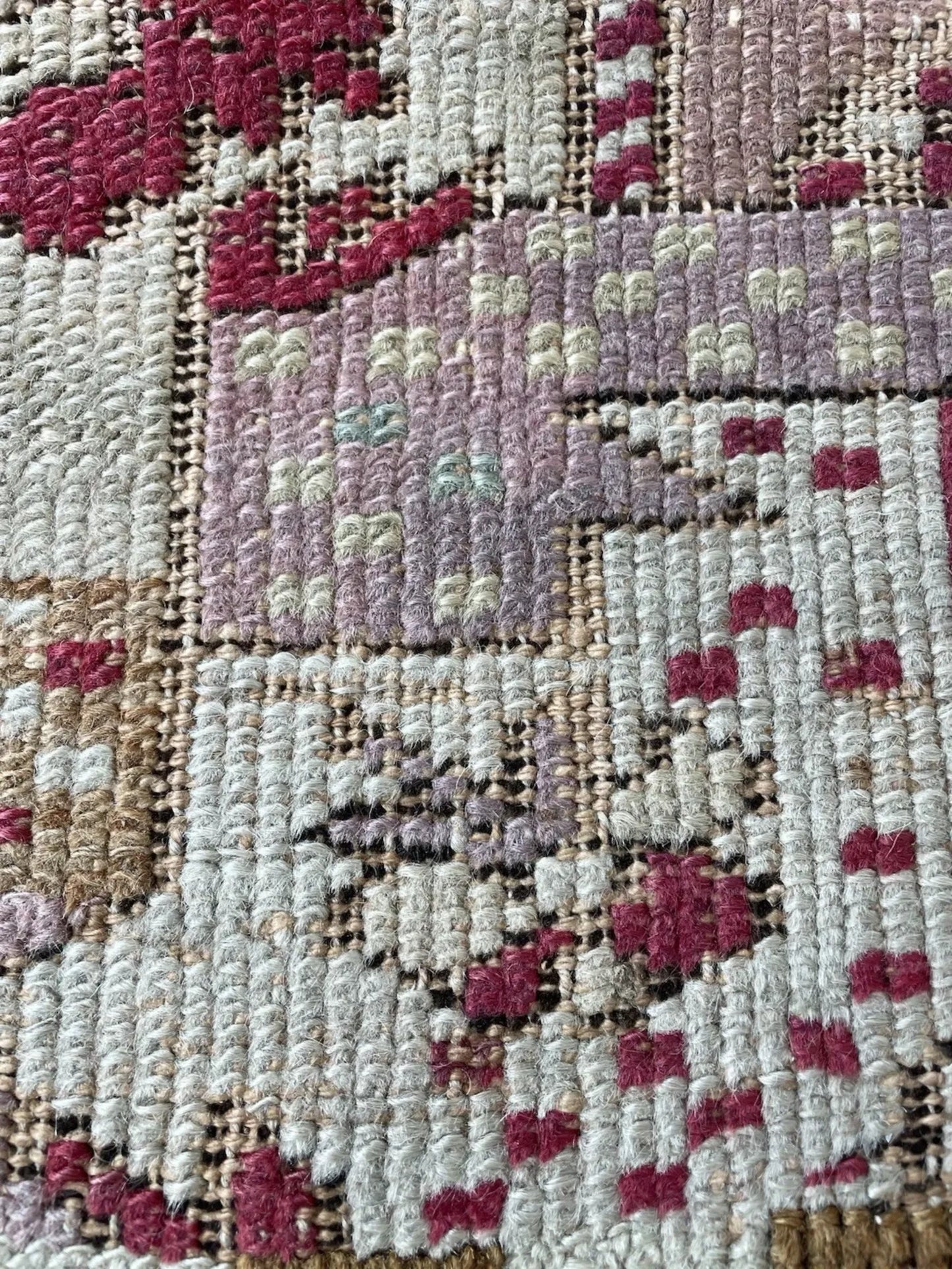 Traditional prayer niche on crimson red field

