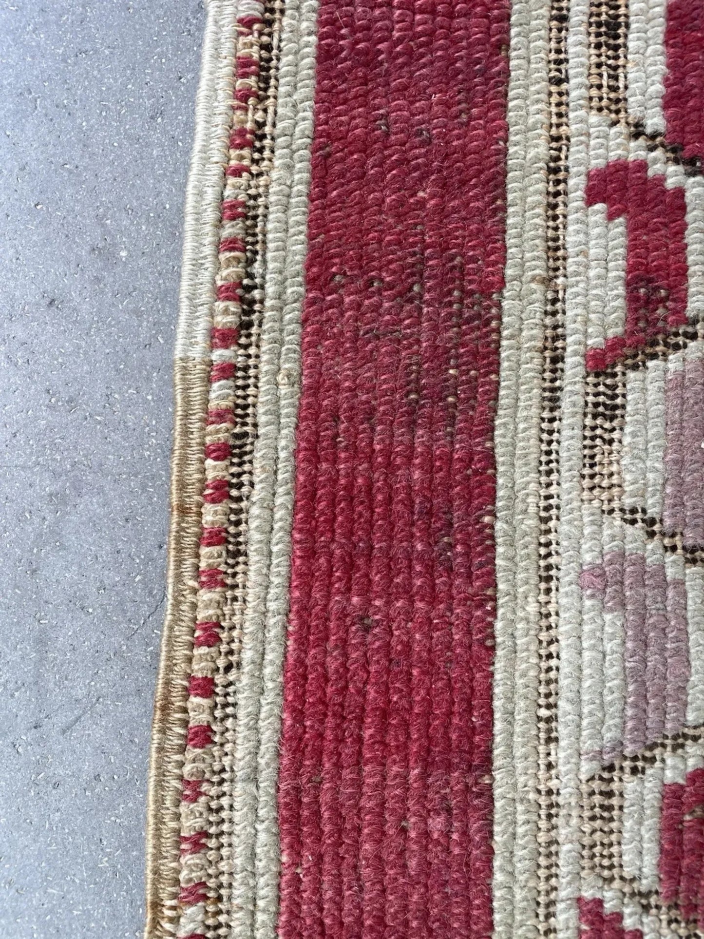 Stylized floral motifs in ivory and sage green

