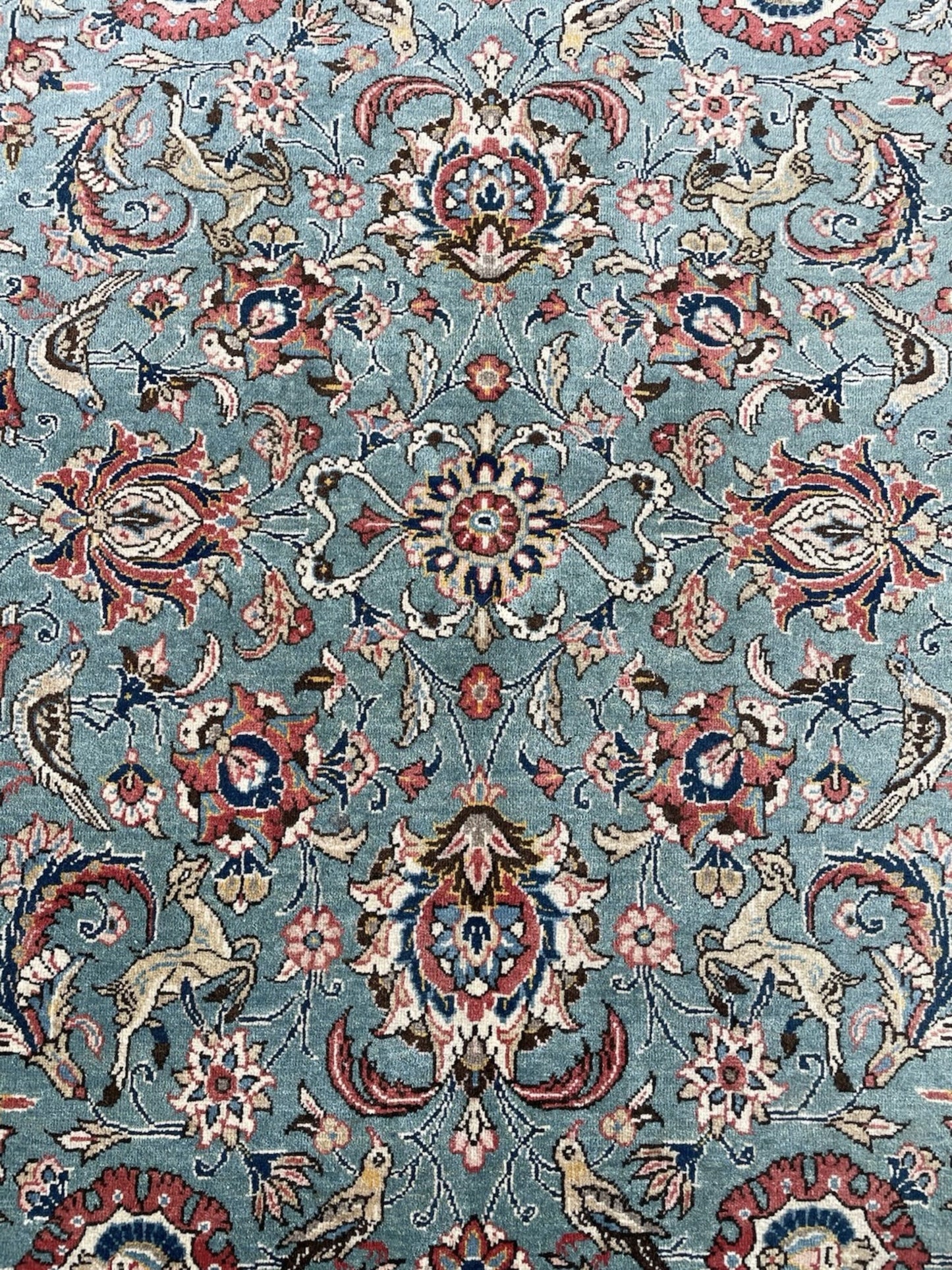 Color contrast between aqua field and dark motifs

