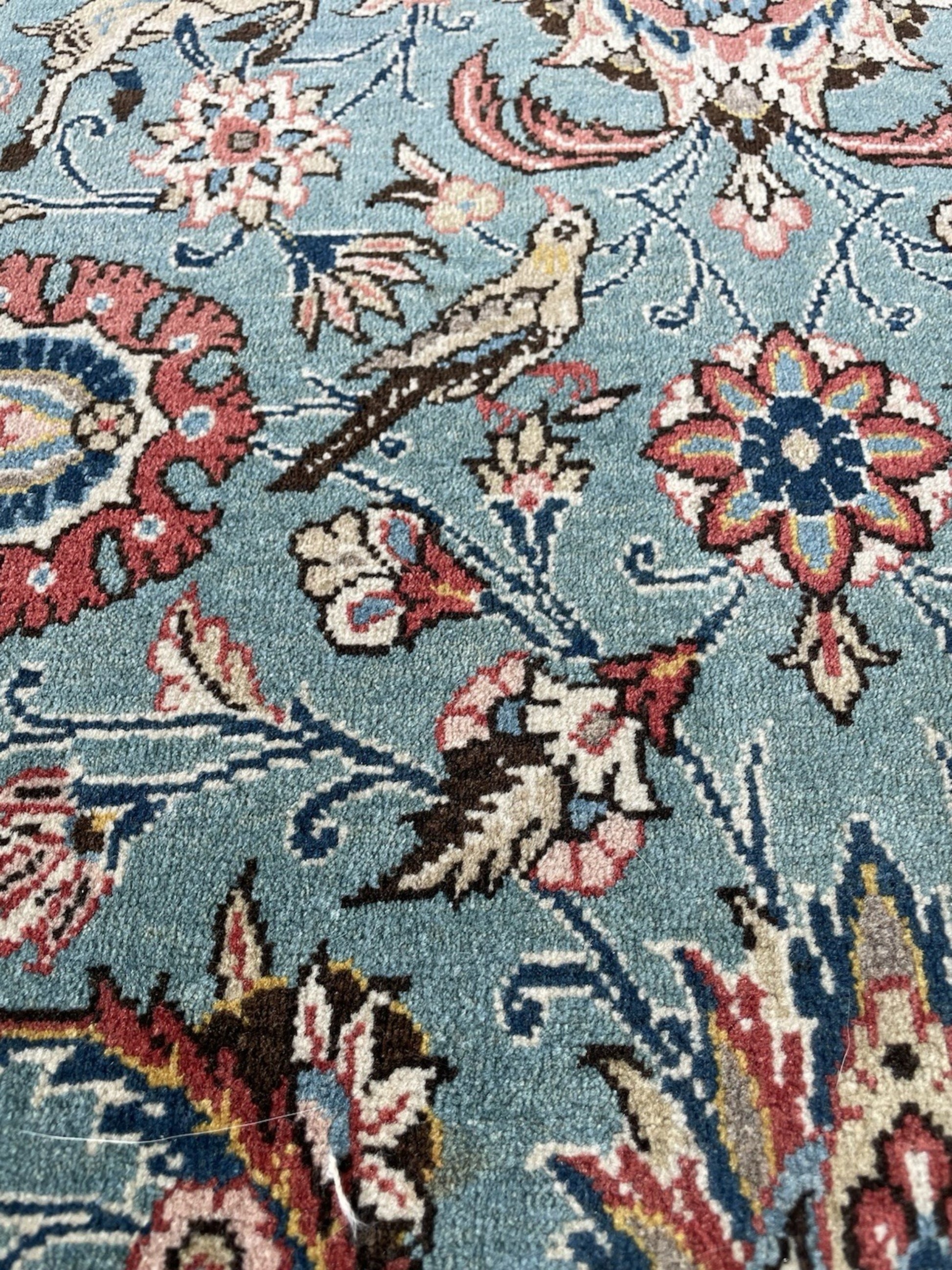 Intricate vine and blossom details

