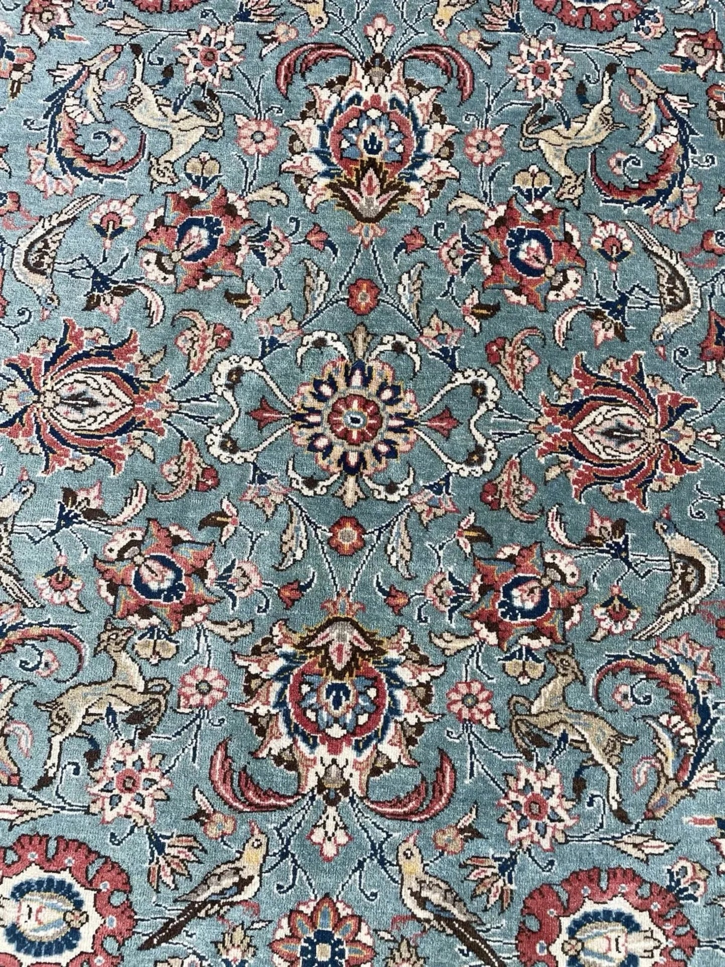 Complex floral patterns in deep red and navy

