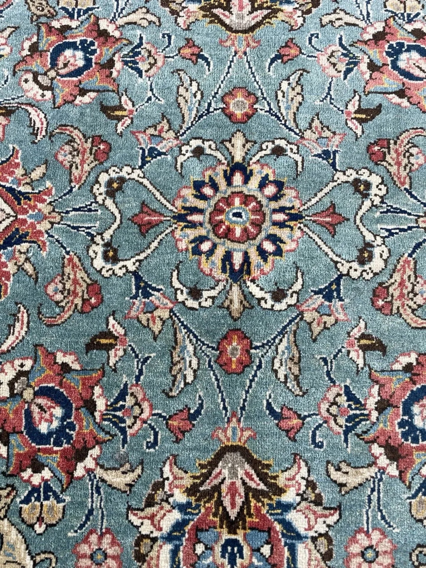 Ivory and coral accents throughout design

