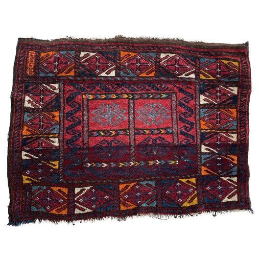 Antique Jaf bagface with tribal medallions on crimson field

