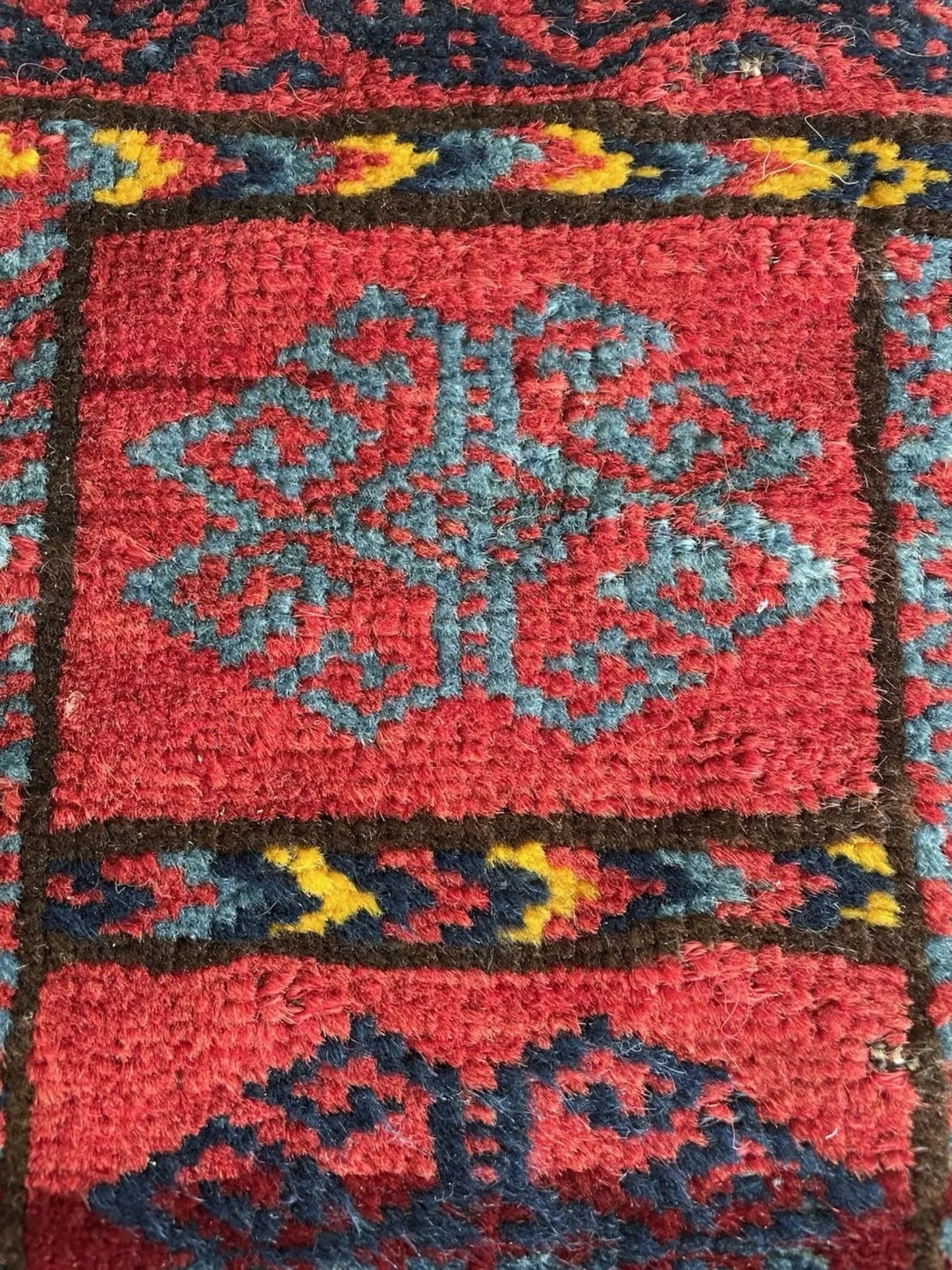 Close-up of intricate tribal pattern details

