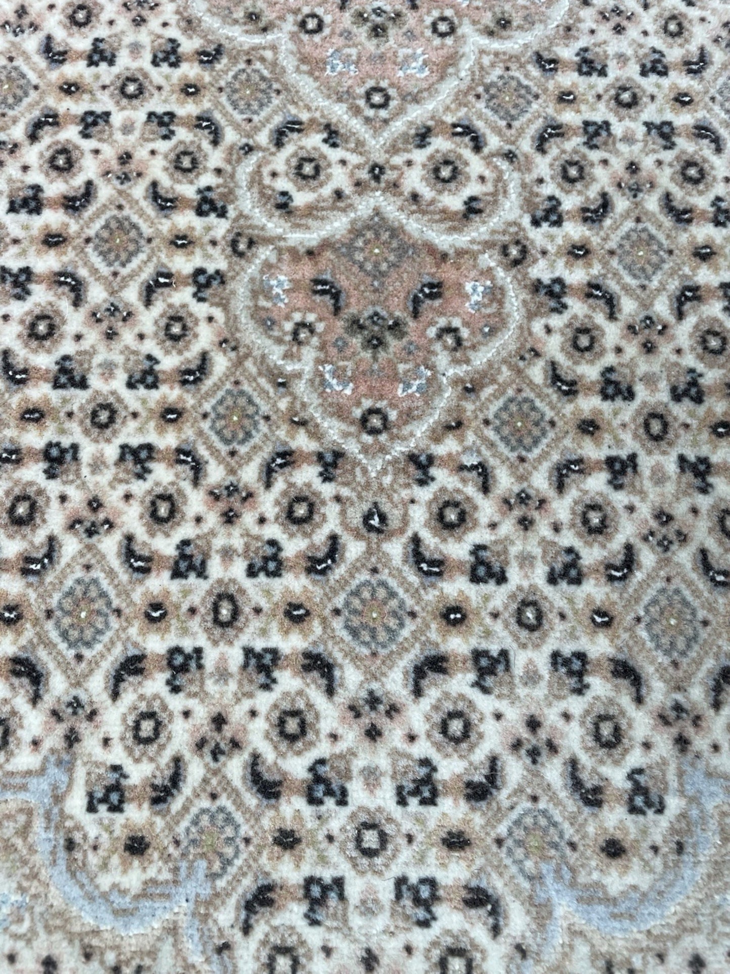 Individual rug showing complete medallion composition

