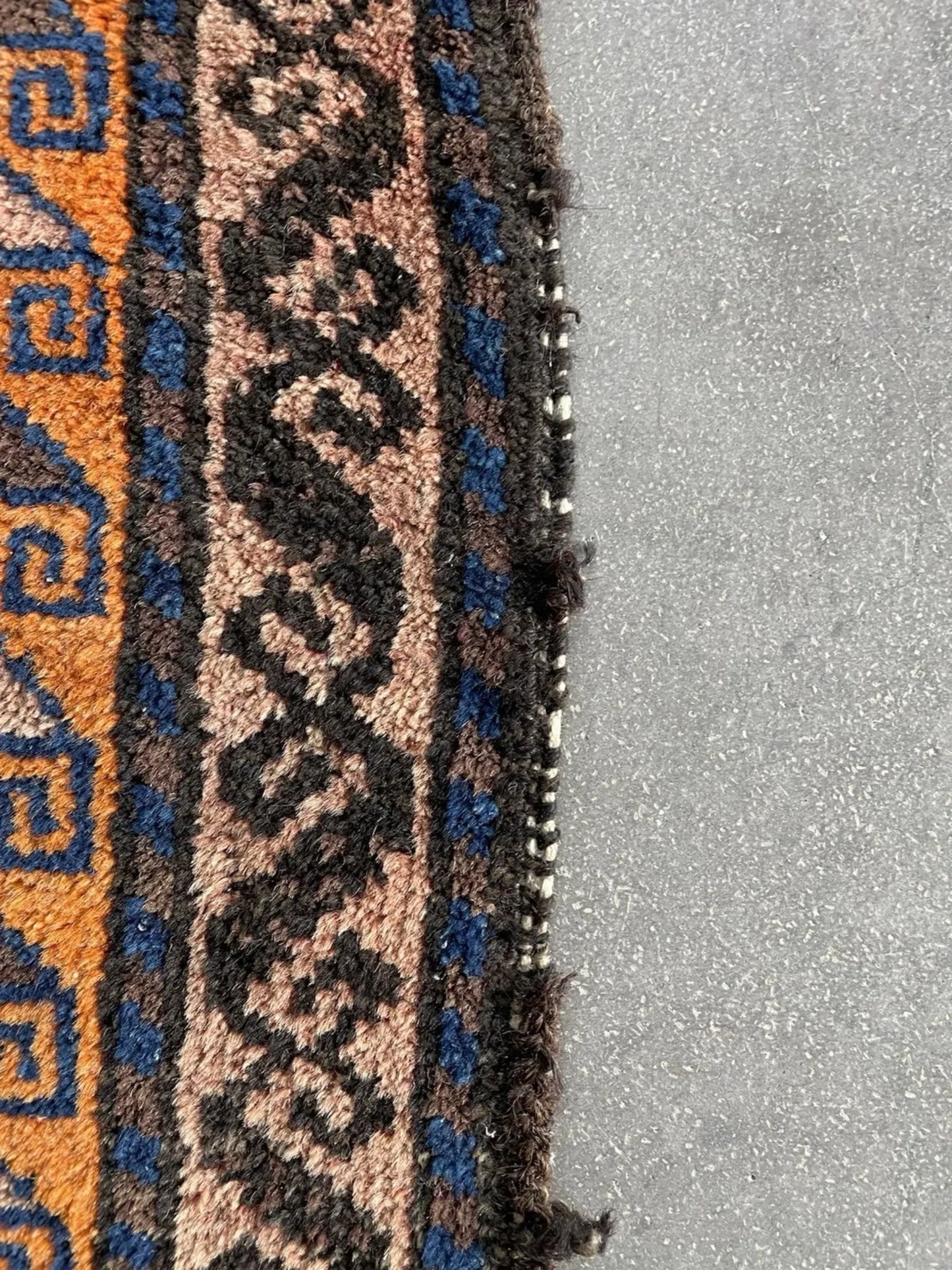 Macro detail of the hand-spun wool and natural dye variations.

