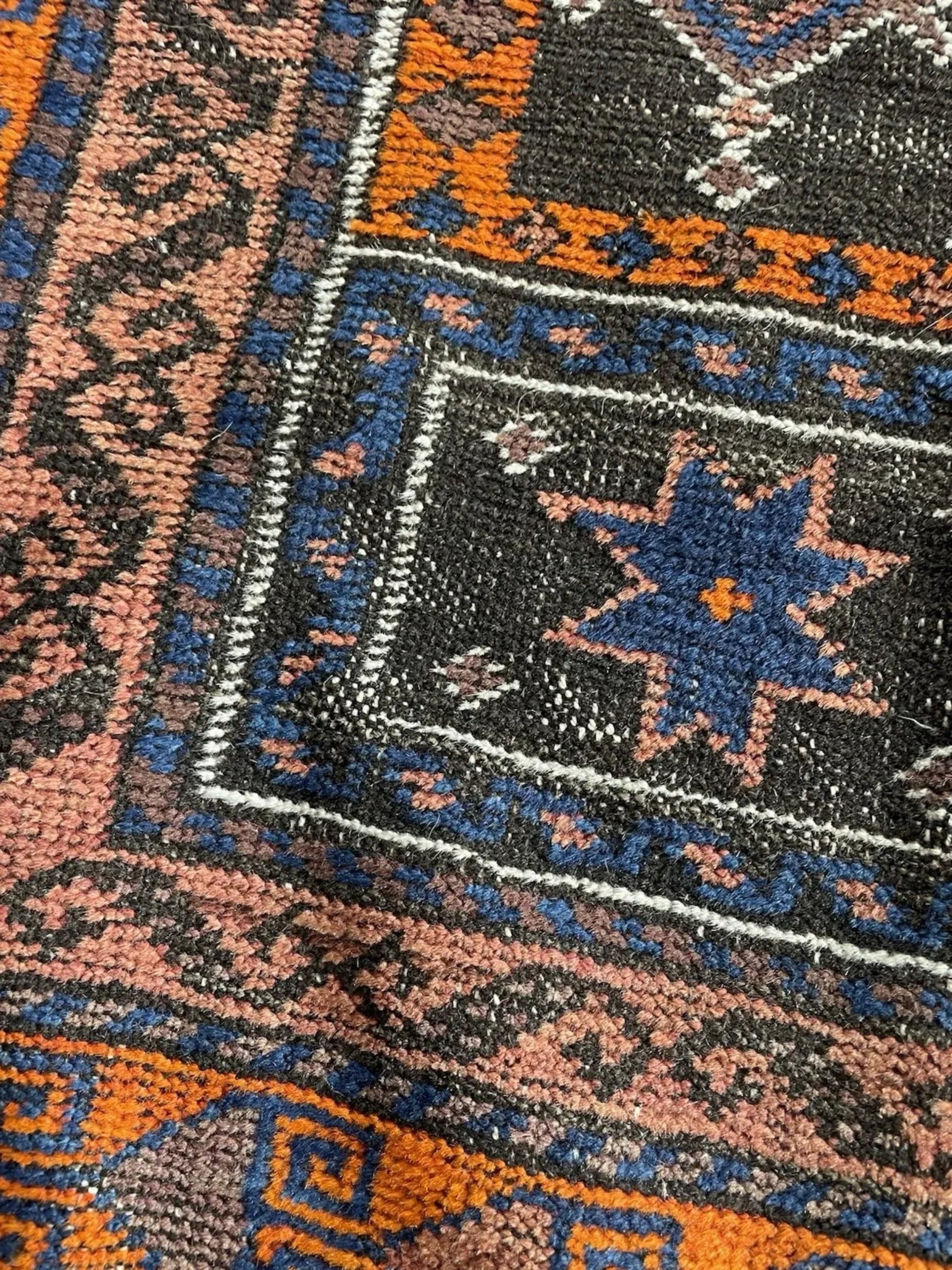 Macro shot of the geometric and talismanic patterns within the field.


