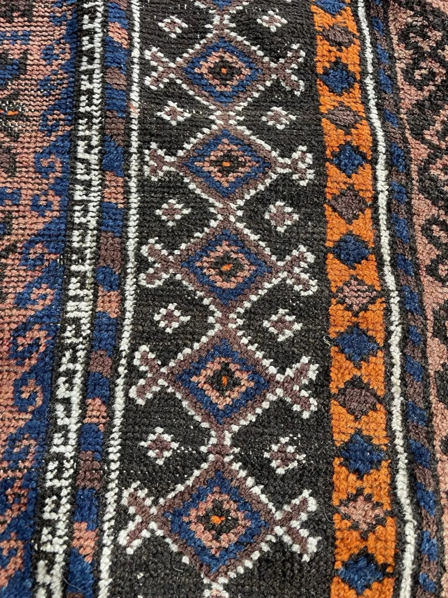 Side angle view showing the rug's flat, age-appropriate low pile.


