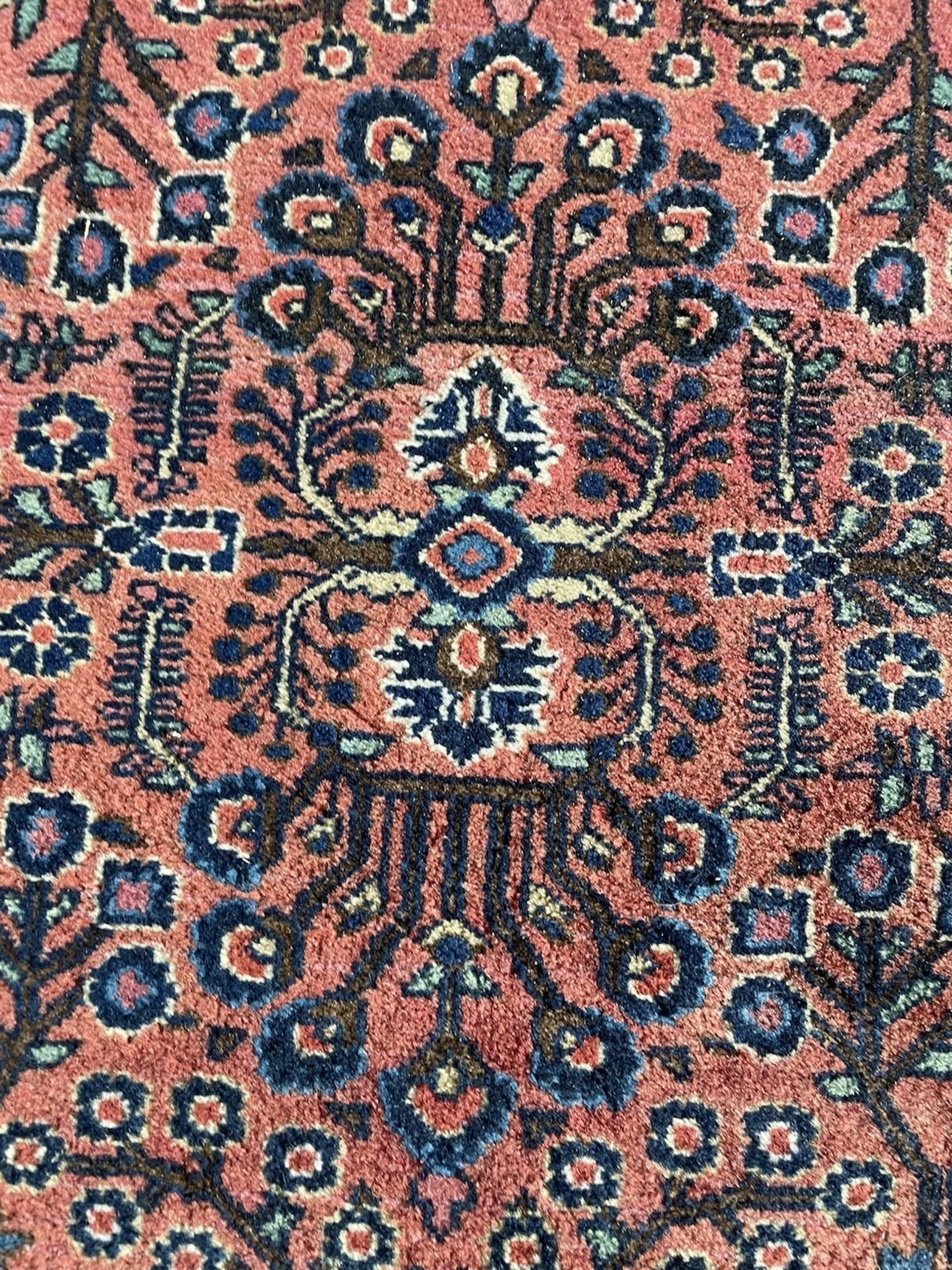 Diagonal angle view of the entire rug showcasing its balanced composition.

