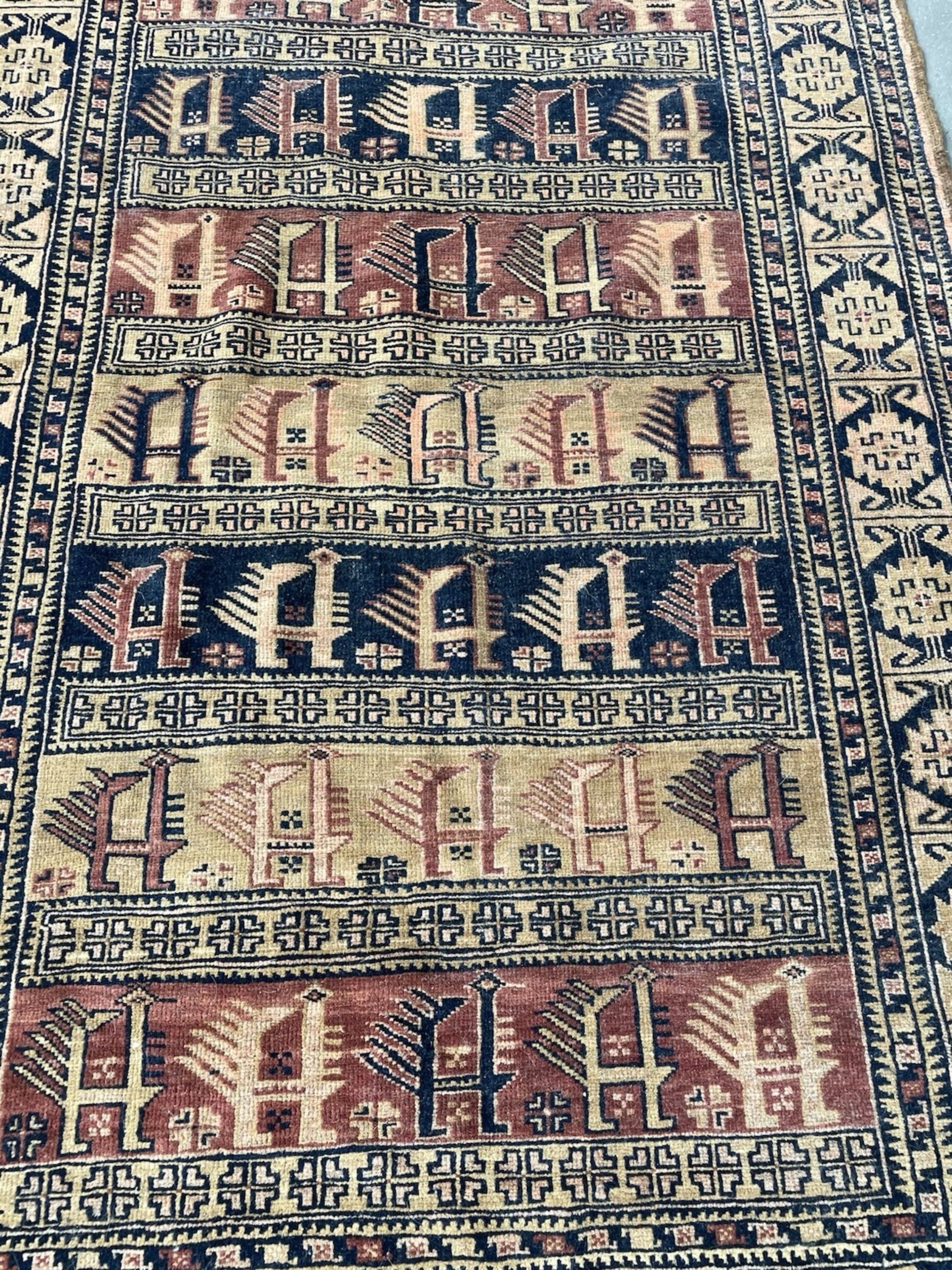 The back of the rug revealing the dense and consistent hand-knotted weave.

