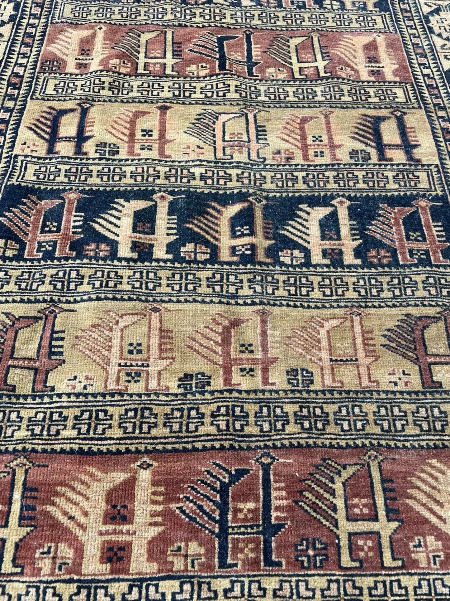 Afghan Baluch collectible rug corner detail displaying traditional border system and authentic tribal craftsmanship