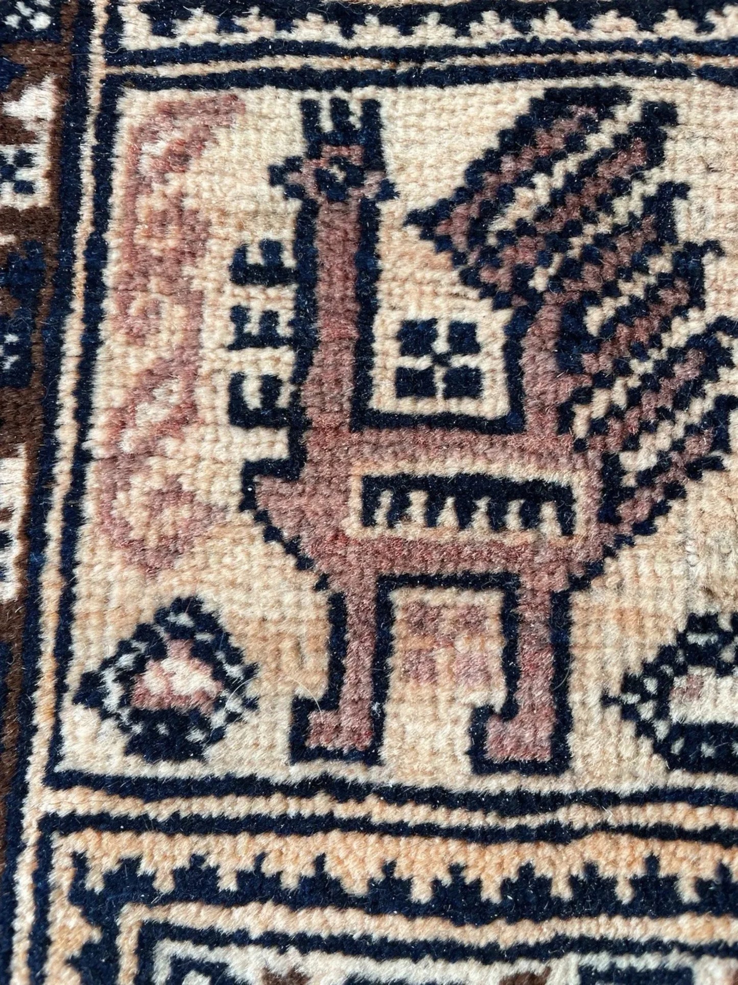 Detailed shot of the navy blue and ivory accents within the pattern.

