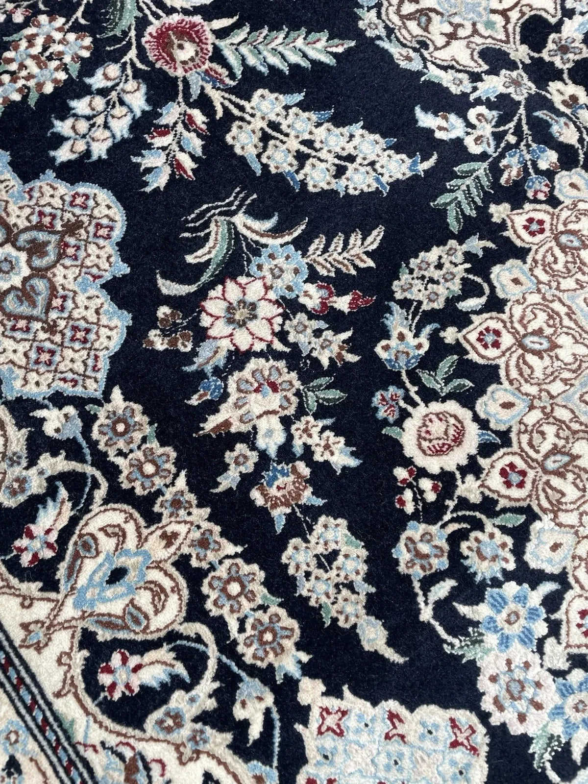 Finely woven vintage Persian Nain rug measuring 4.4 x 6.7 feet, handmade from wool in Iran circa 1960.

