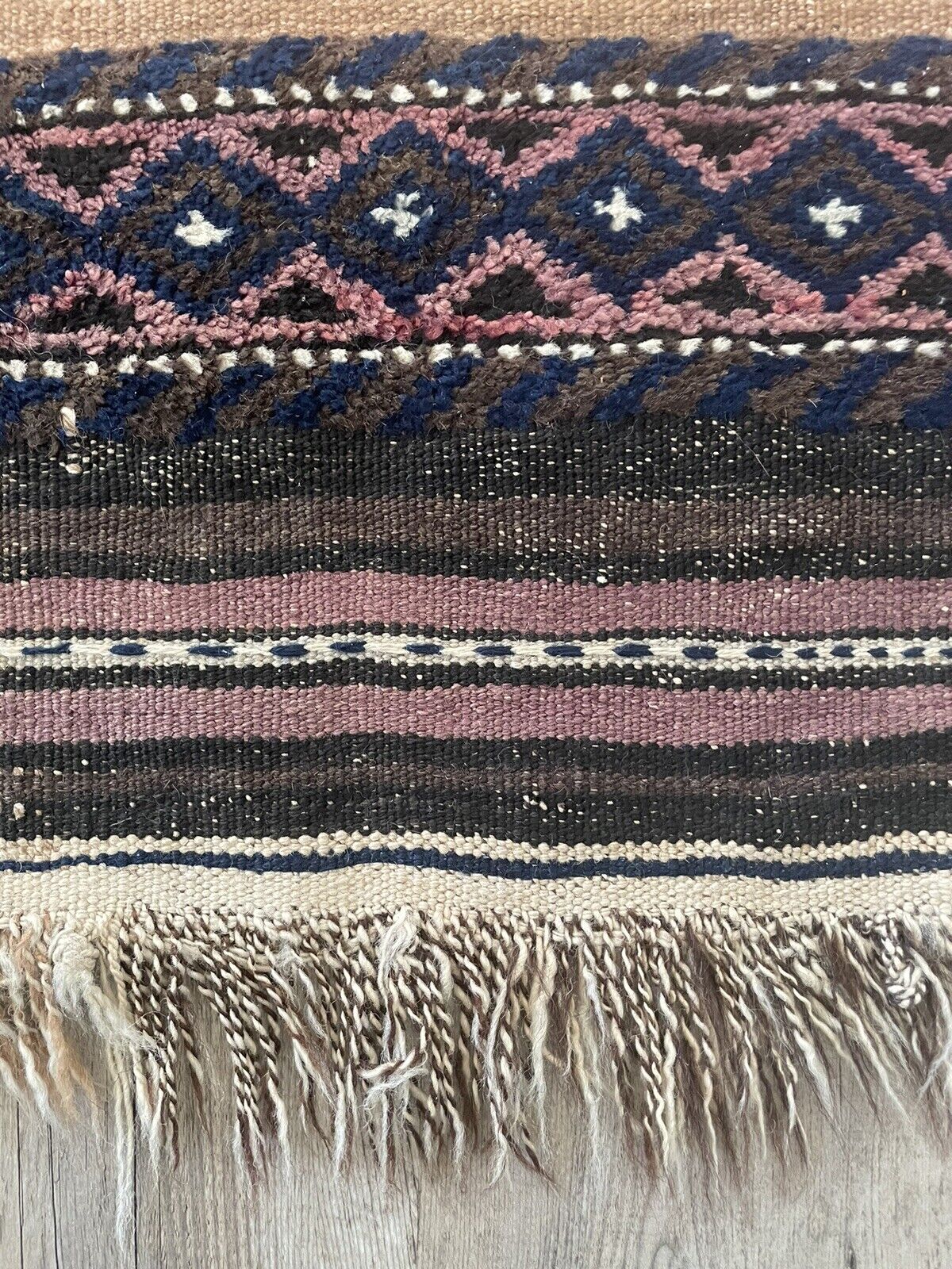 Close-up of kilim design on Handmade Antique Afghan Baluch Collectible Rug - Detailed view highlighting the flat-woven kilim design at the center of the rug, adding texture and visual interest.