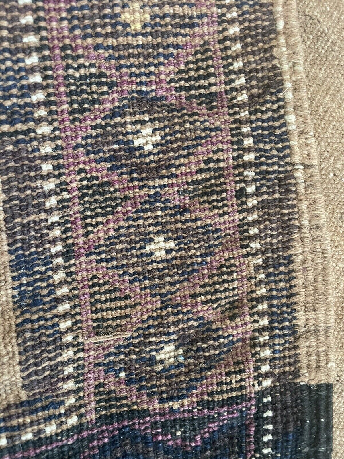 Back side of the Handmade Antique Afghan Baluch Collectible Rug - Underside view revealing the rug's construction and material.