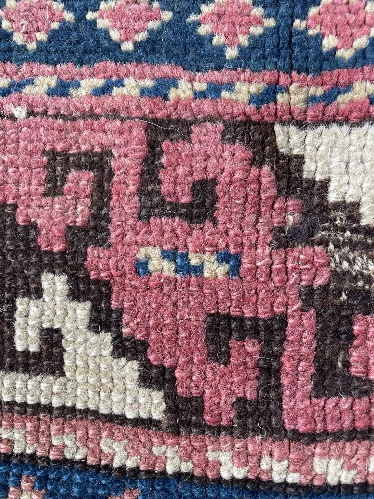 Antique Caucasian rug measuring 4'1" × 3'6", hand-knotted with Turkish symmetrical knots using heavy-gauge wool pile on wool foundation, in good to very good condition with medium-high pile of 5–7mm.

