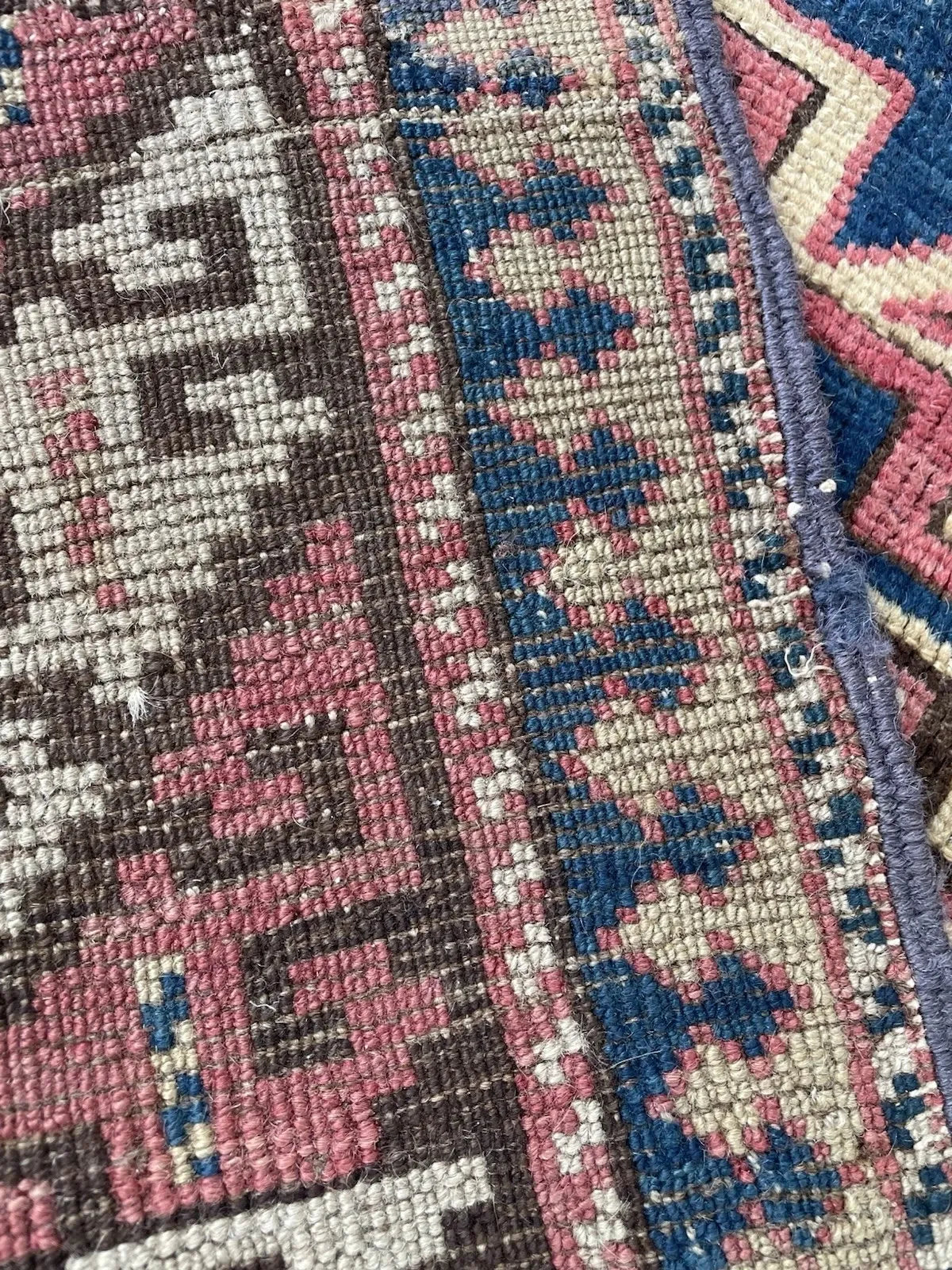 Antique rug from the southwestern Caucasus (Kazak region, present-day Armenia/Azerbaijan border), circa 1880, with a bold single large medallion composition on a deep royal blue ground of great warmth and authority.

