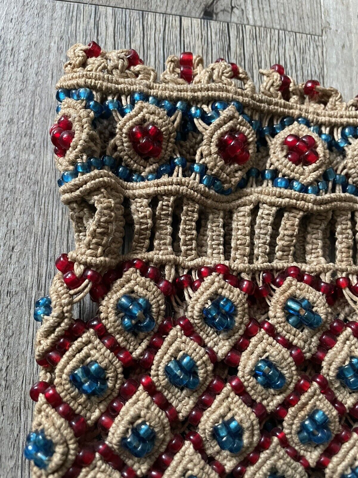 A close-up of the natural cotton fabric used in the handmade vintage Malian bag (1960s), highlighting its texture and durability.