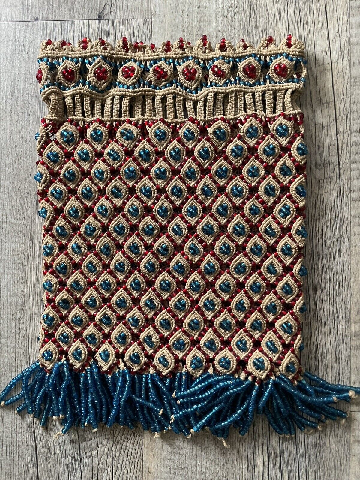A close-up of the crocheting technique used in the construction of the handmade vintage Malian bag (1960s), showcasing the traditional craftsmanship.