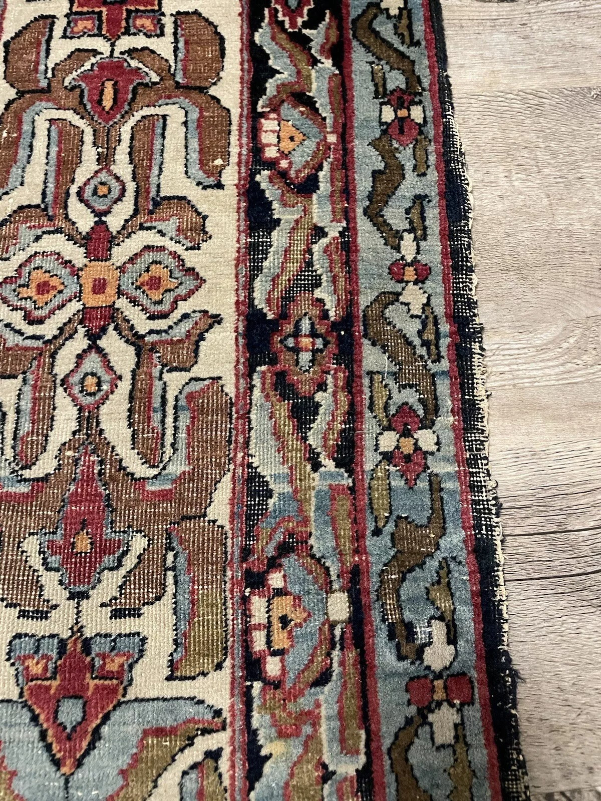 Fine-woven Kerman Lavar rug with a well-preserved low pile

