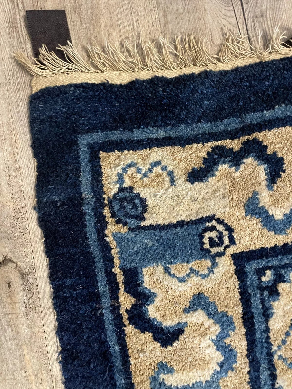 Hand-knotted antique Peking rug with a refined aesthetic
