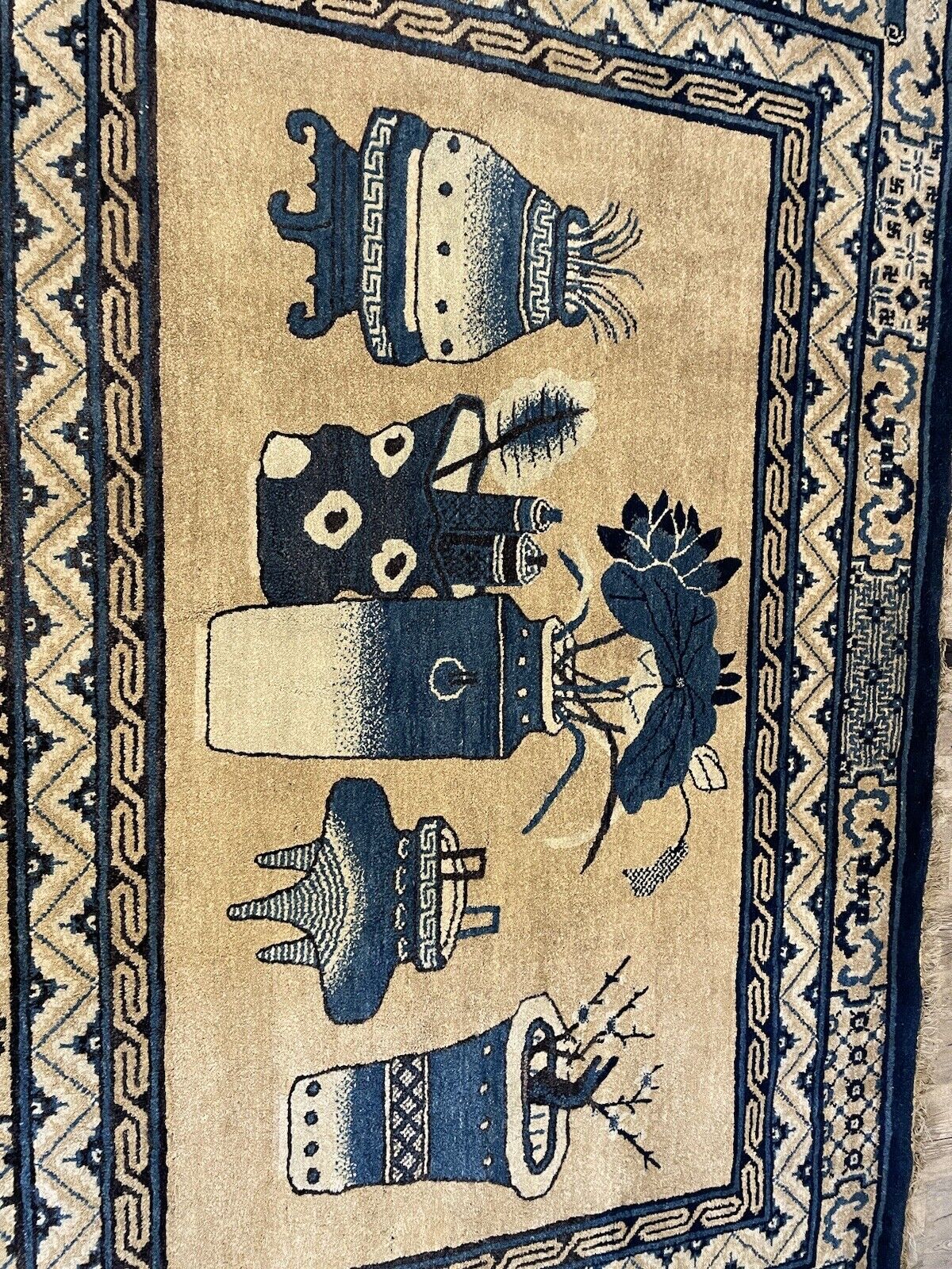 Authentic early 20th-century Chinese wool rug with floral motifs
