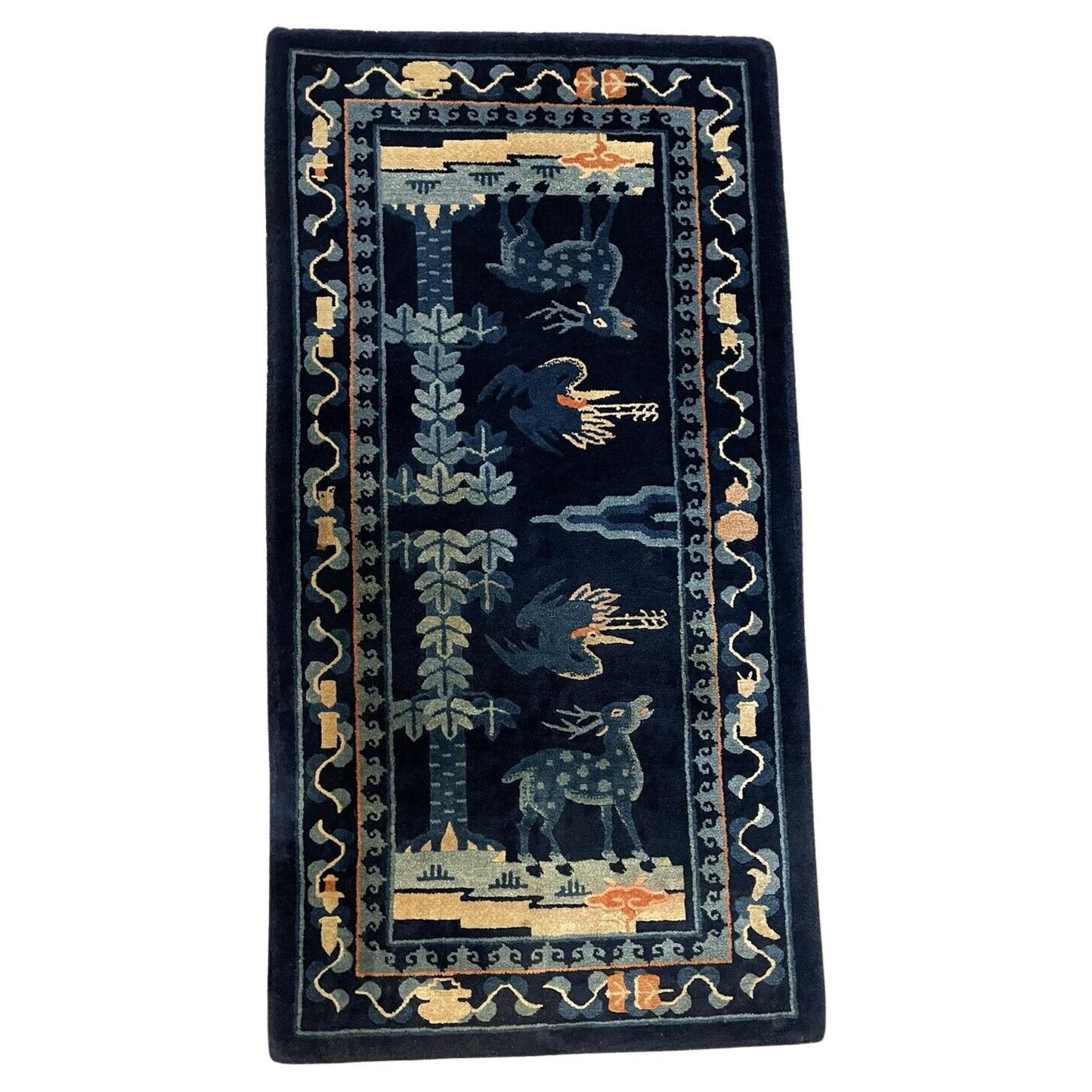 Handmade antique Peking Chinese rug with deer and bird motifs
