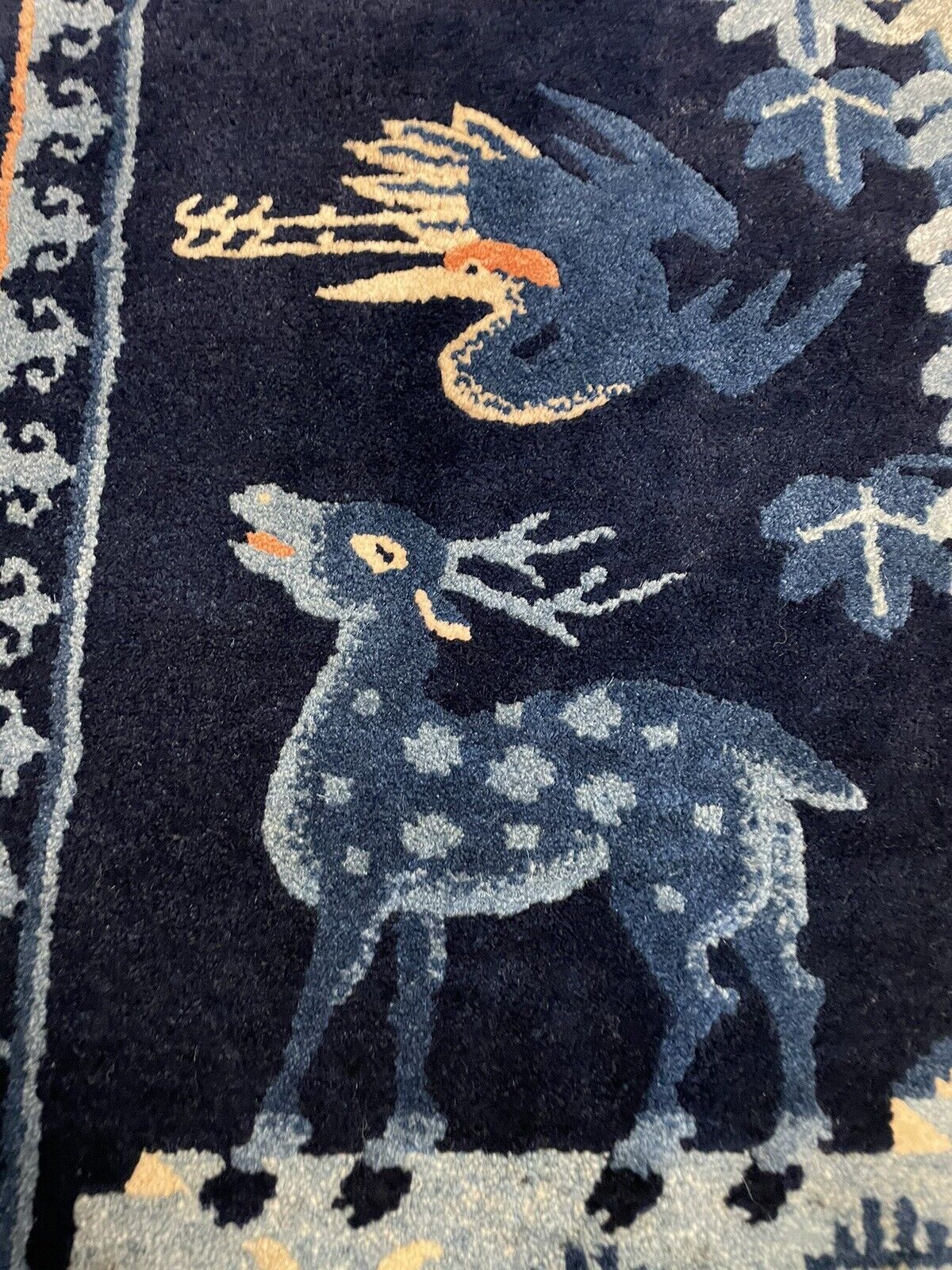 A timeless Chinese Peking rug with harmonious nature patterns
