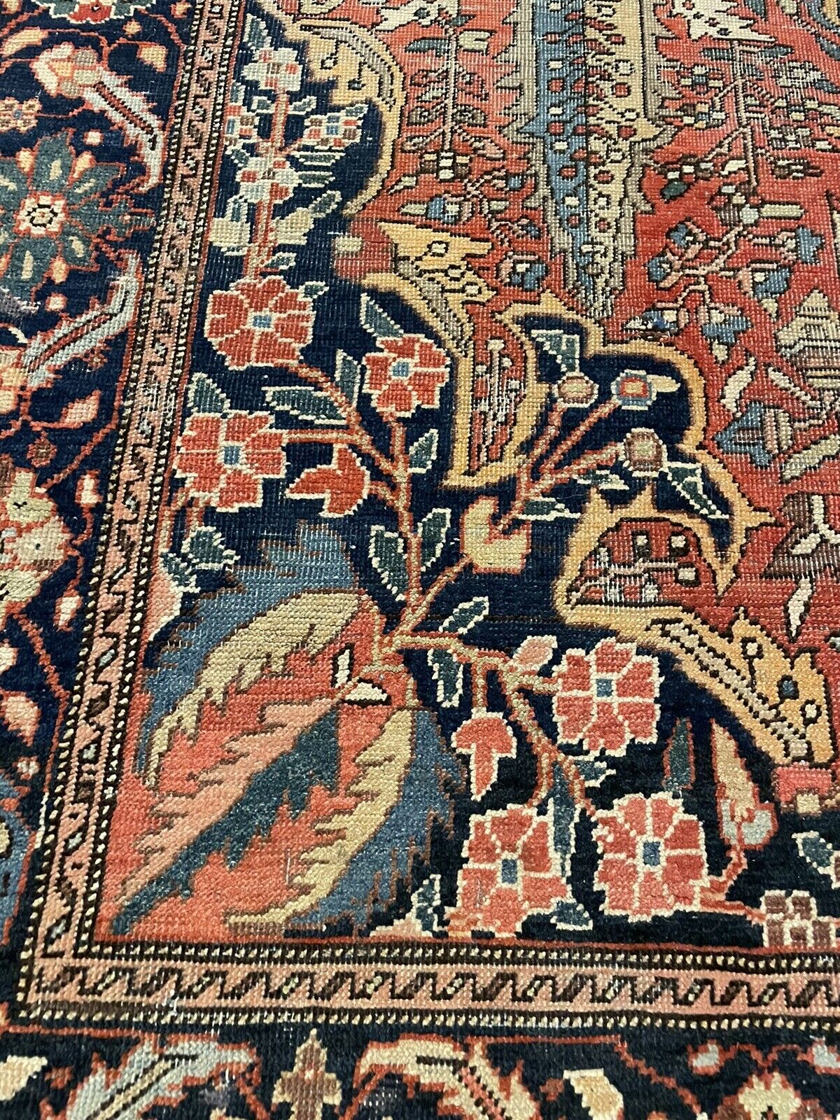 Traditional Persian rug showcasing 19th-century craftsmanship
