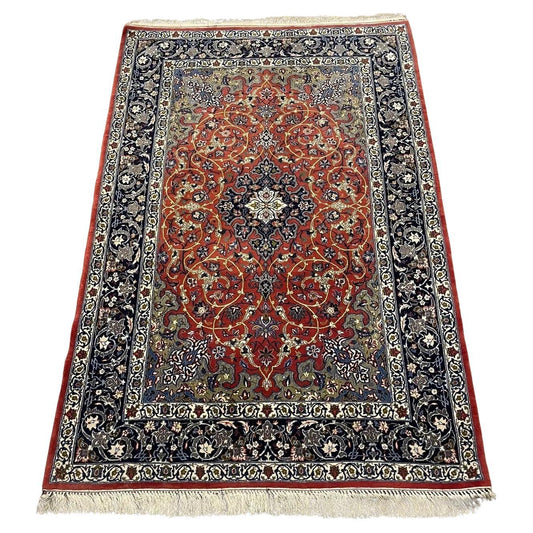 Handmade vintage Persian Isfahan wool and silk rug from the 1970s
