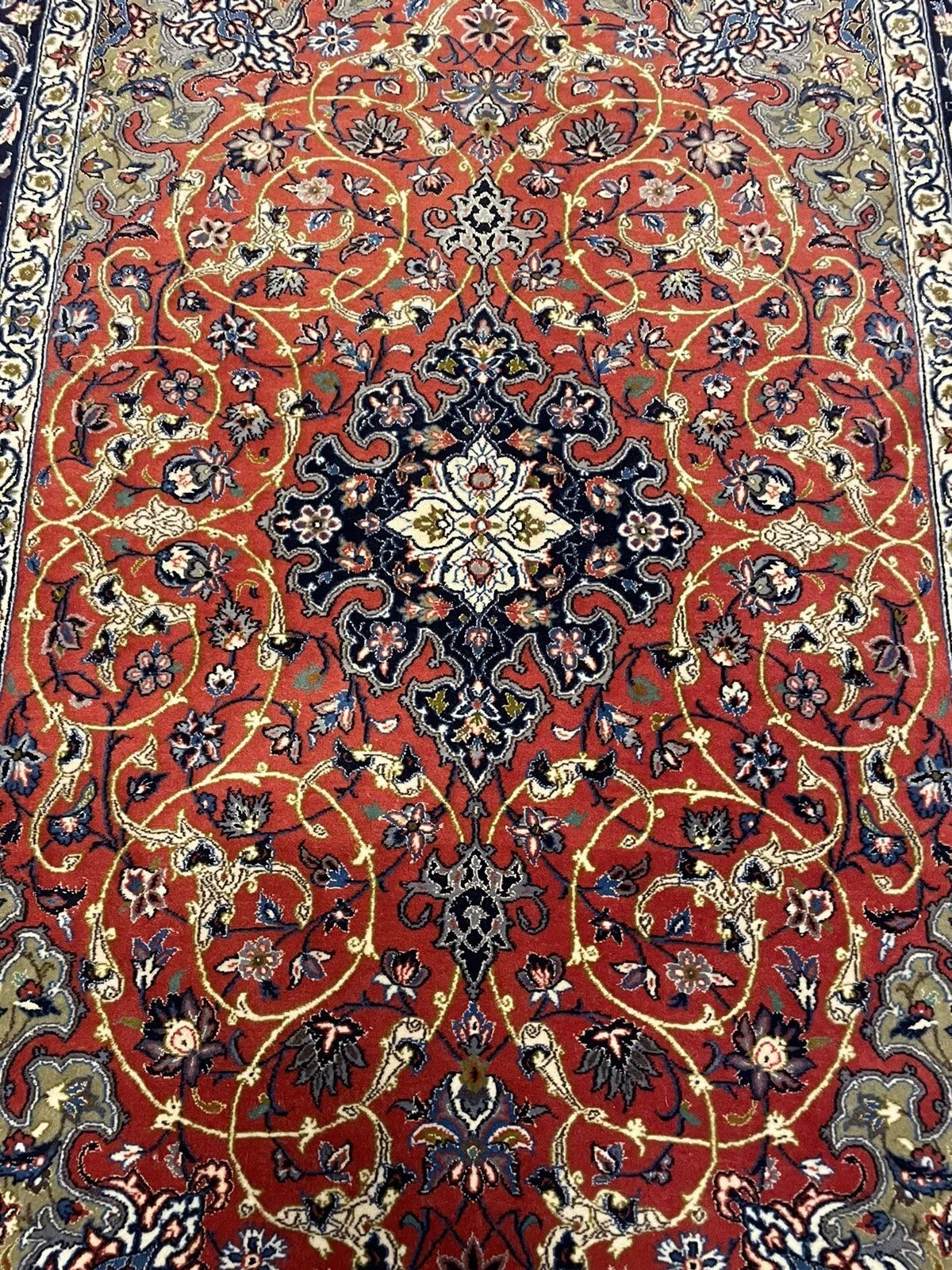 Collectible Persian rug with exquisite floral patterns and medallion design
