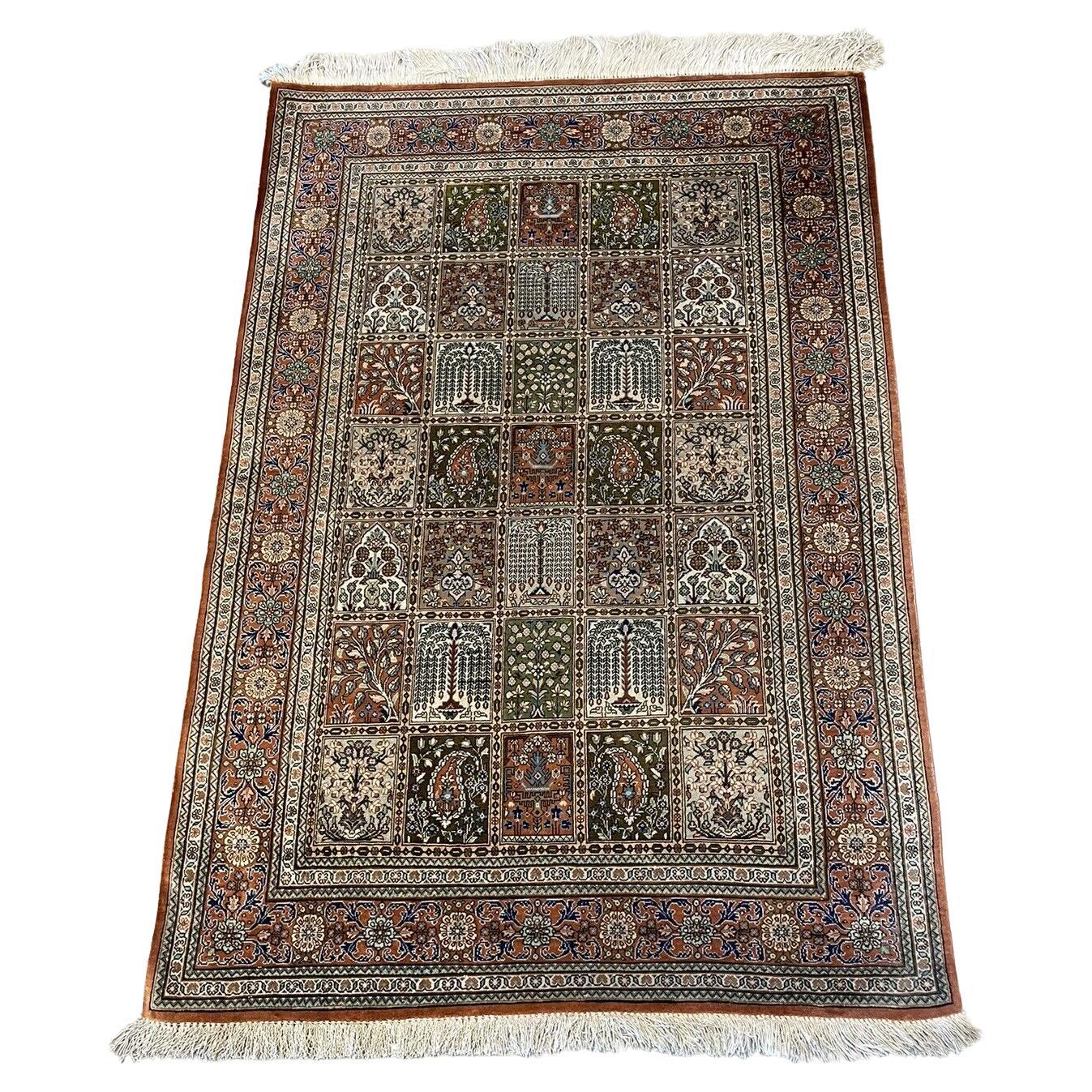 Handmade vintage Persian Qum silk rug from the 1950s
