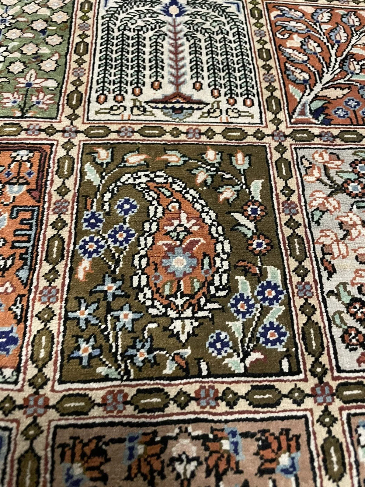 A rare Persian Qum rug perfect for collectors and decorators
