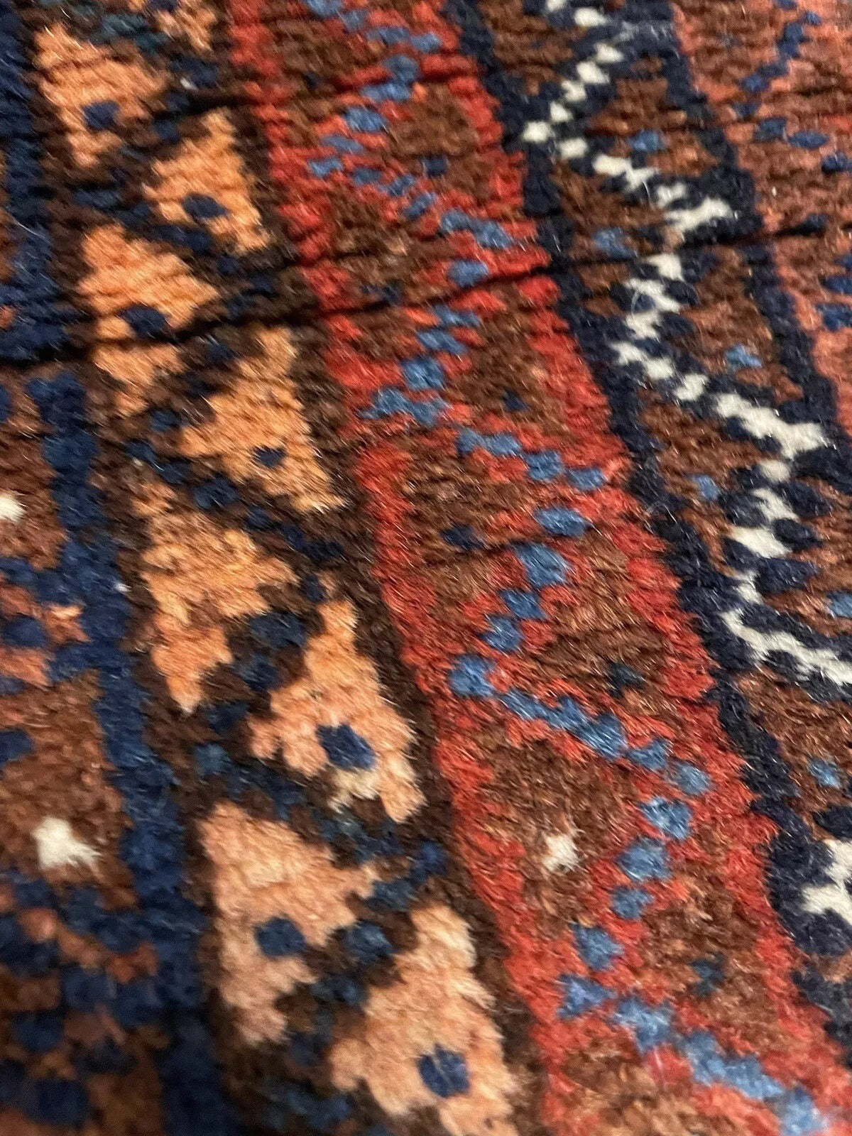 High-quality wool weave of an 1880s Persian tribal rug
