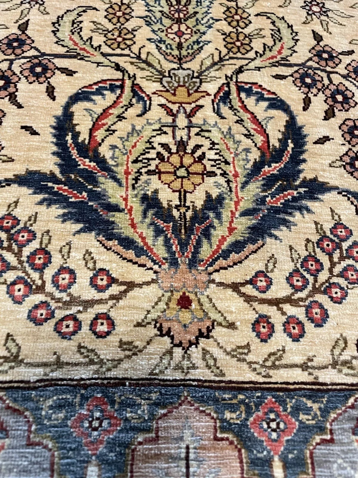 A highly collectible handmade vintage Turkish silk rug
