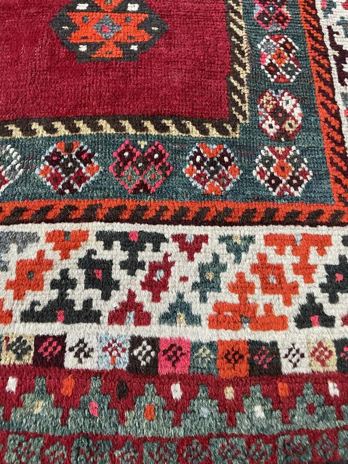 Persian Gabbeh rug showcasing geometric artistry and bold colors
