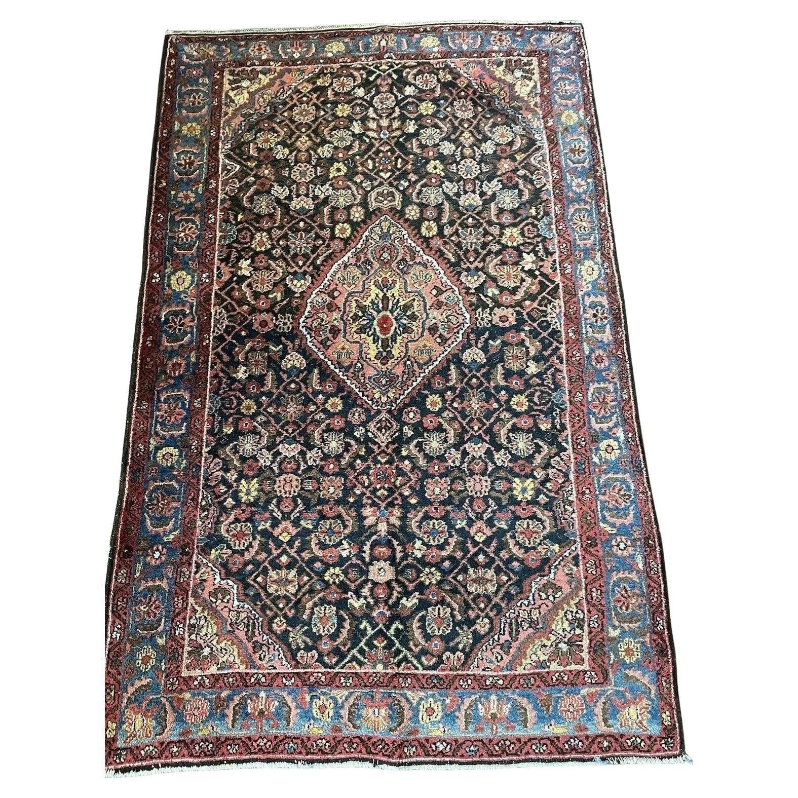 Handmade antique Persian Bidjar wool rug from the 1920s
