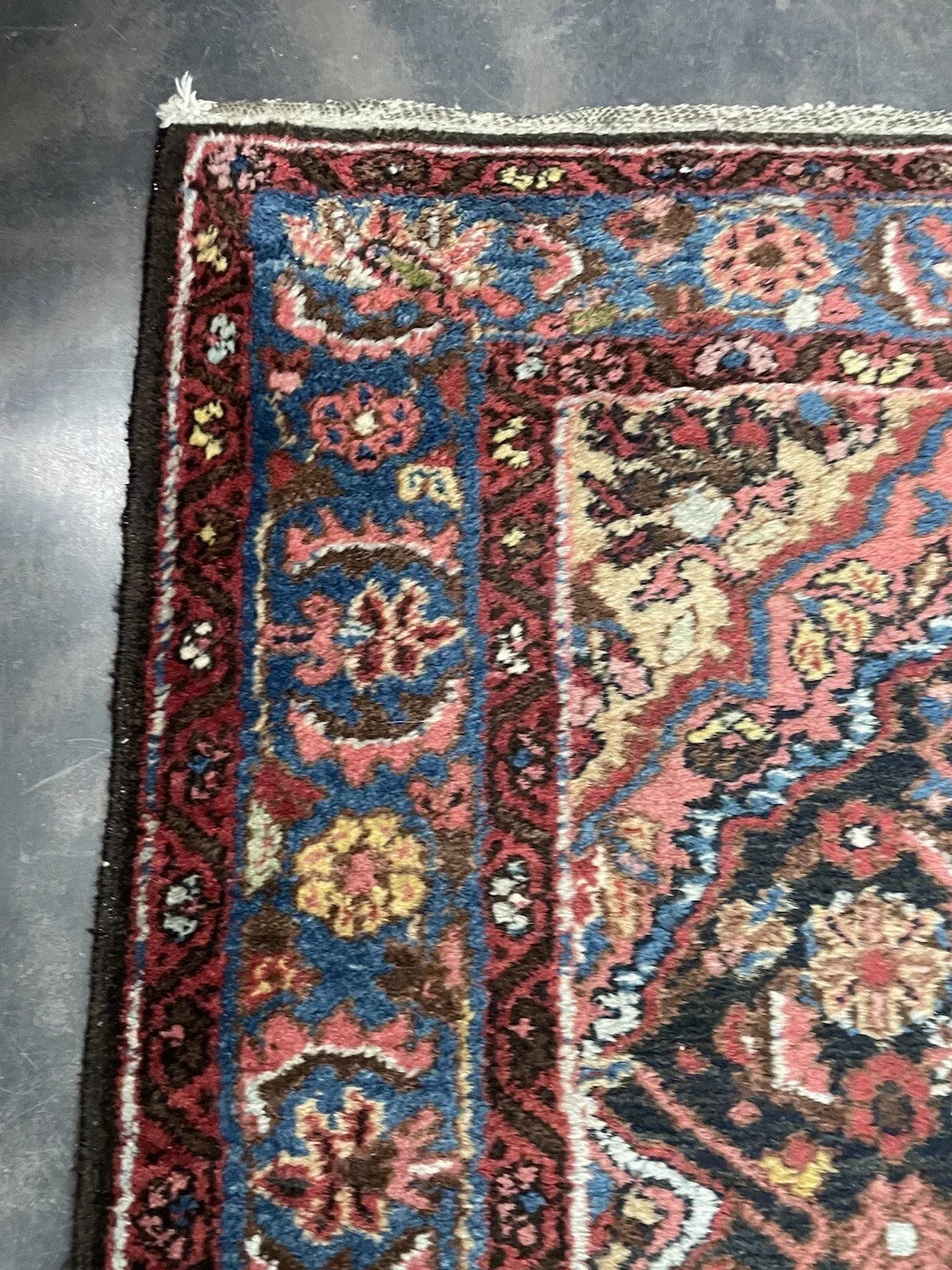 Antique hand-knotted Bidjar wool rug with timeless elegance
