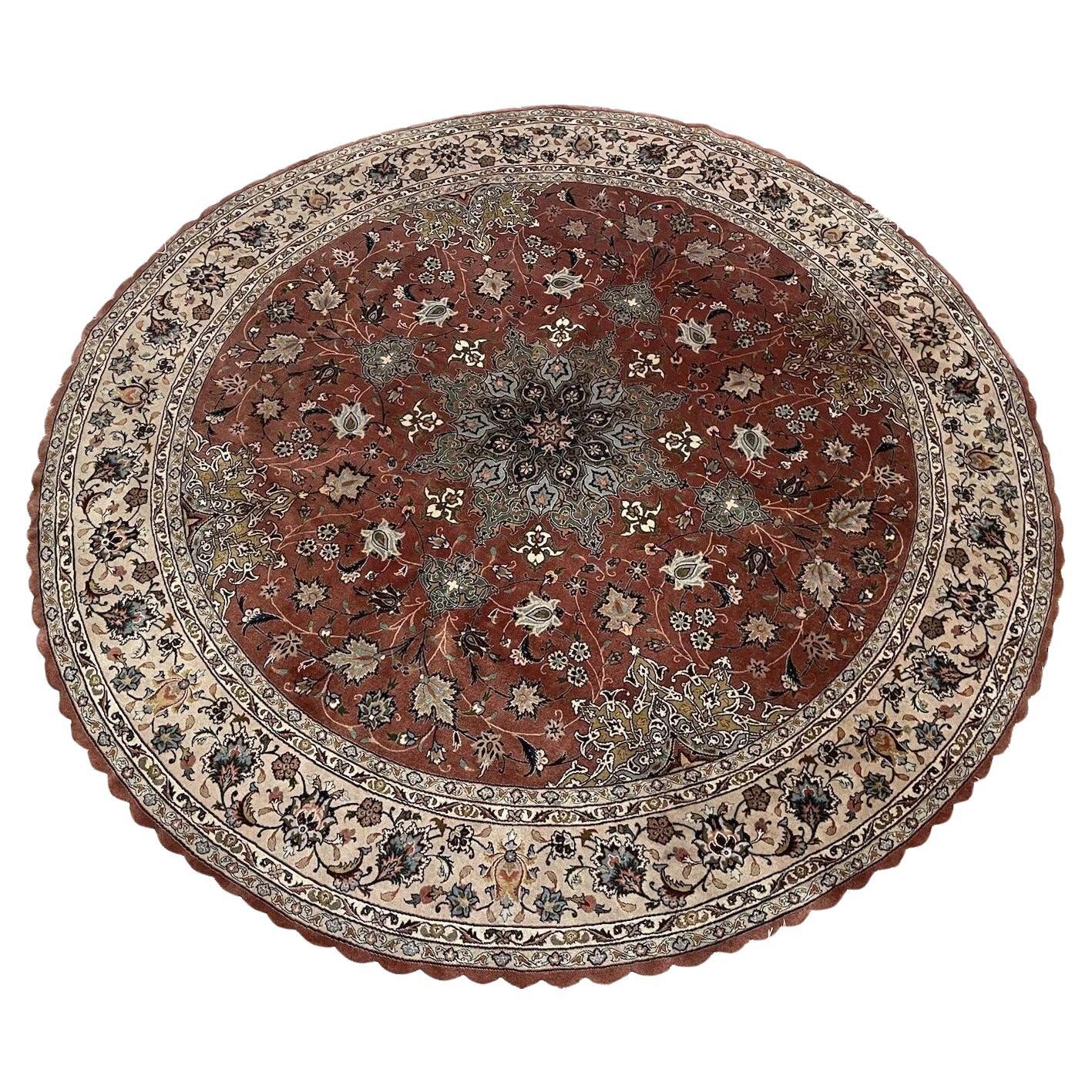 Handmade vintage Persian Tabriz round rug from the 1970s
