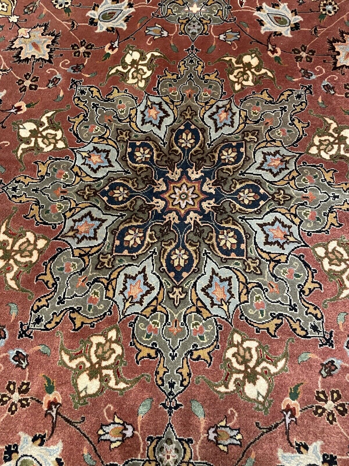 1970s Persian round rug with wool and silk blend
