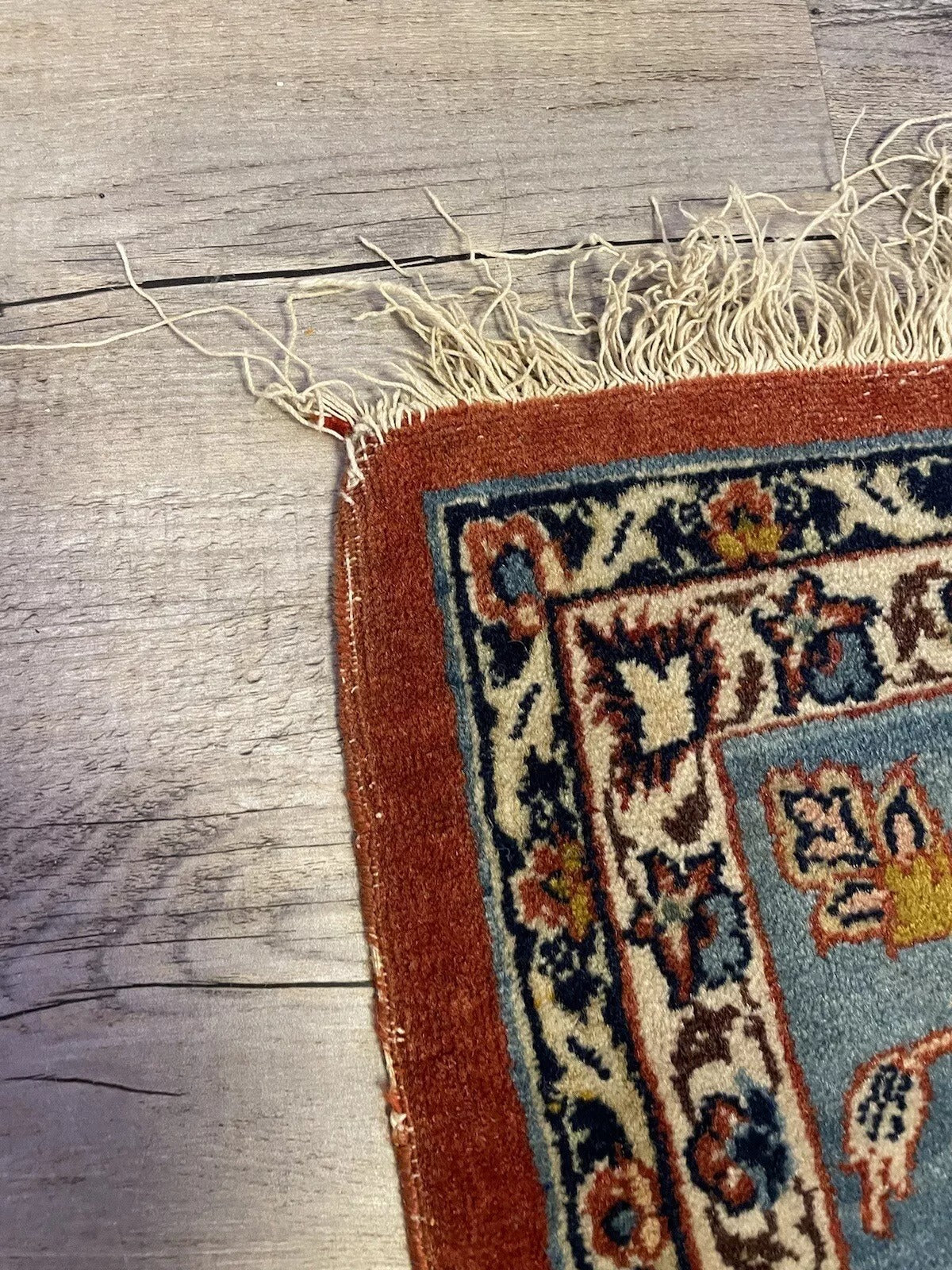 Close-up of antique Kashan rug design — 5.1' x 7.2'

